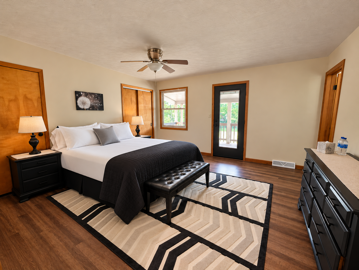 Polished Bedroom with Chevron Rug.png