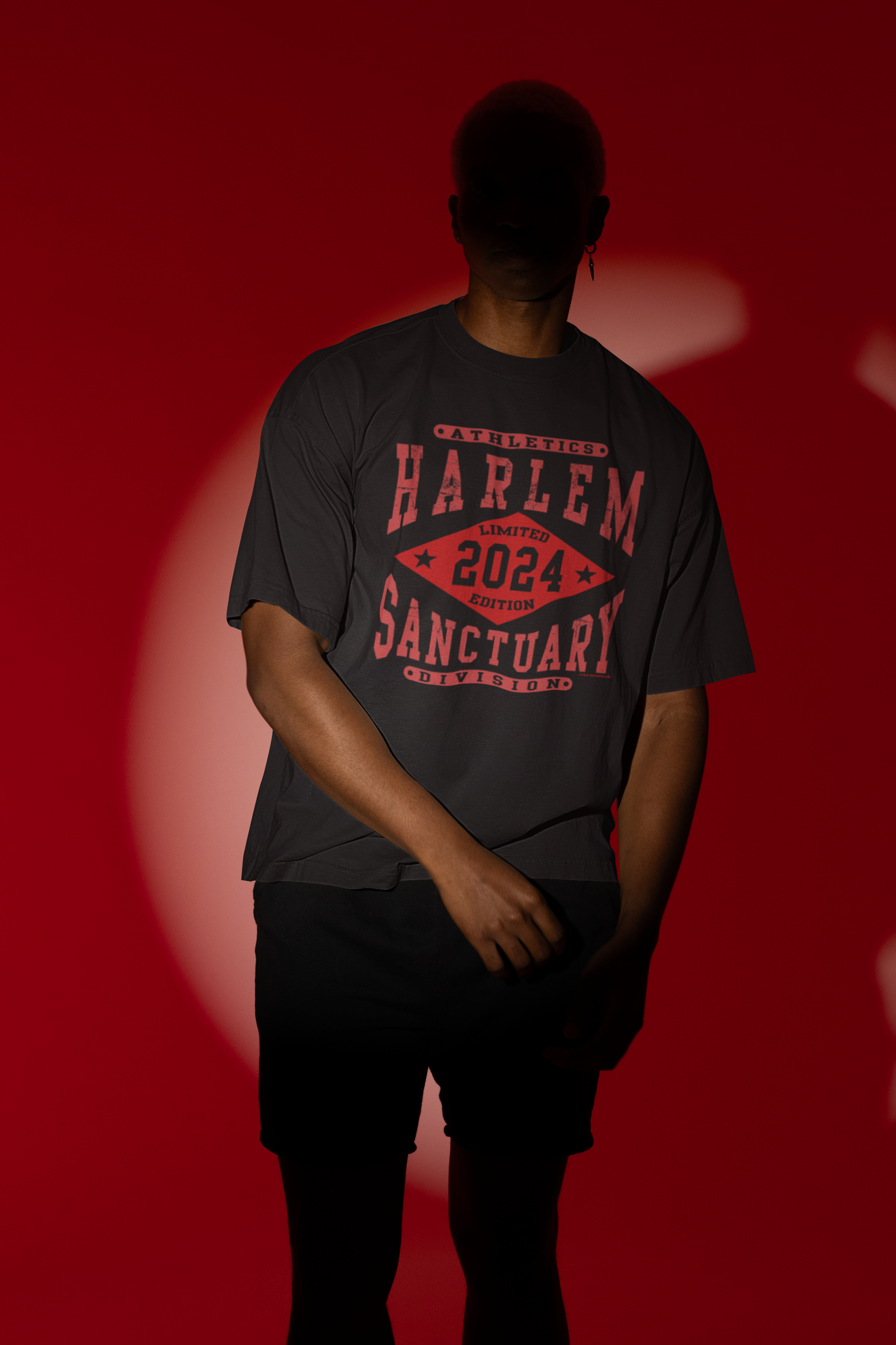 mockup-featuring-a-man-wearing-an-oversized-t-shirt-in-the-middle-of-a-spotlight-m50046.png