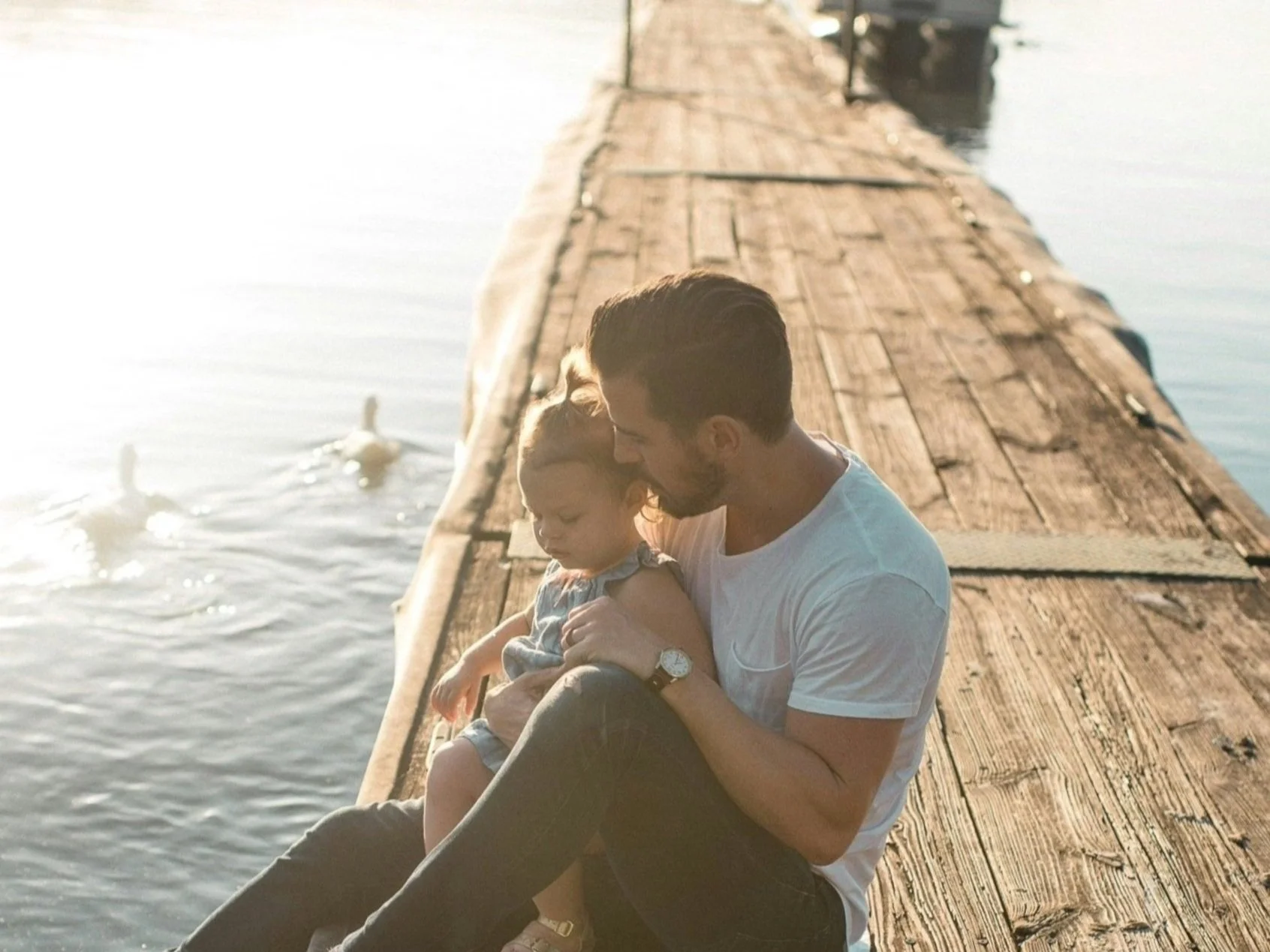 Denver therapy client jumping over hurdle.