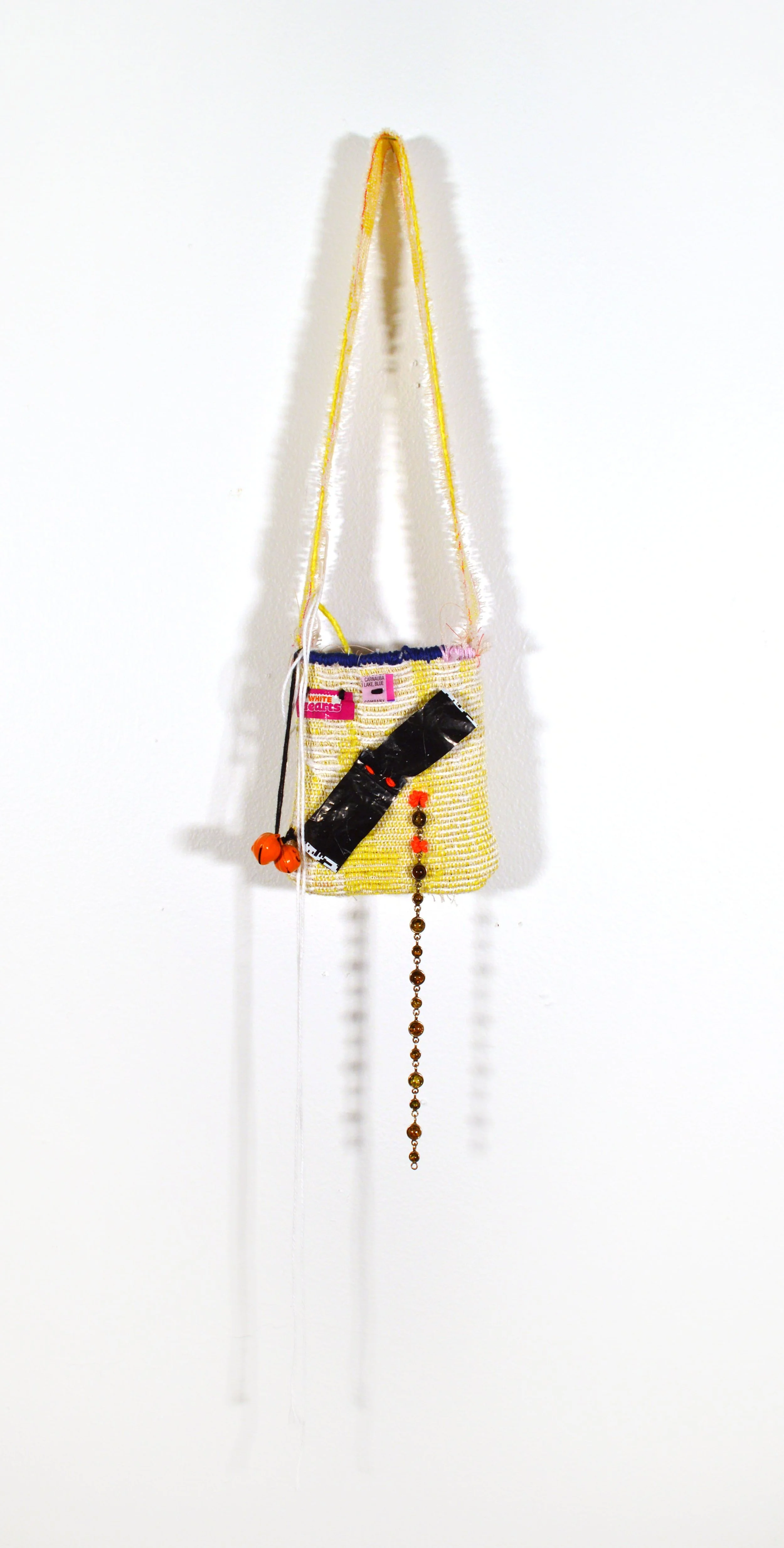 BAG 15

30x3 in
Cotton, wool, plastic, paper, jewelry, metal, clothing.