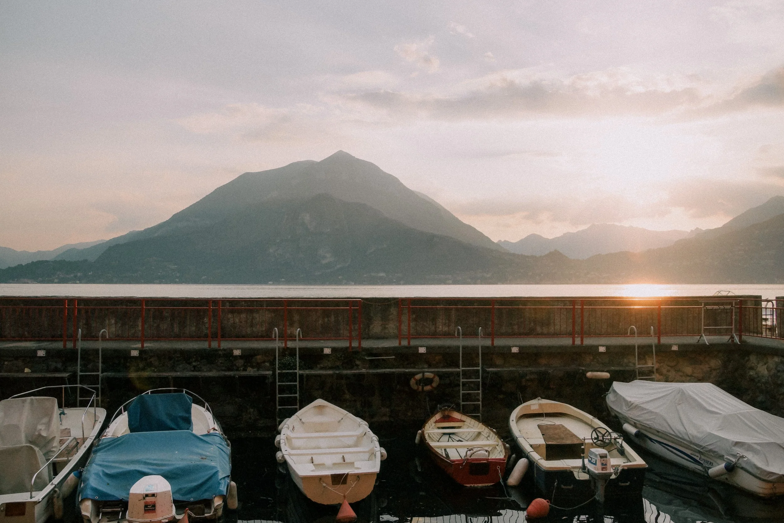 lake-como-italy-harbor-boats-sunset-mountain-travel-photography-02.jpg
