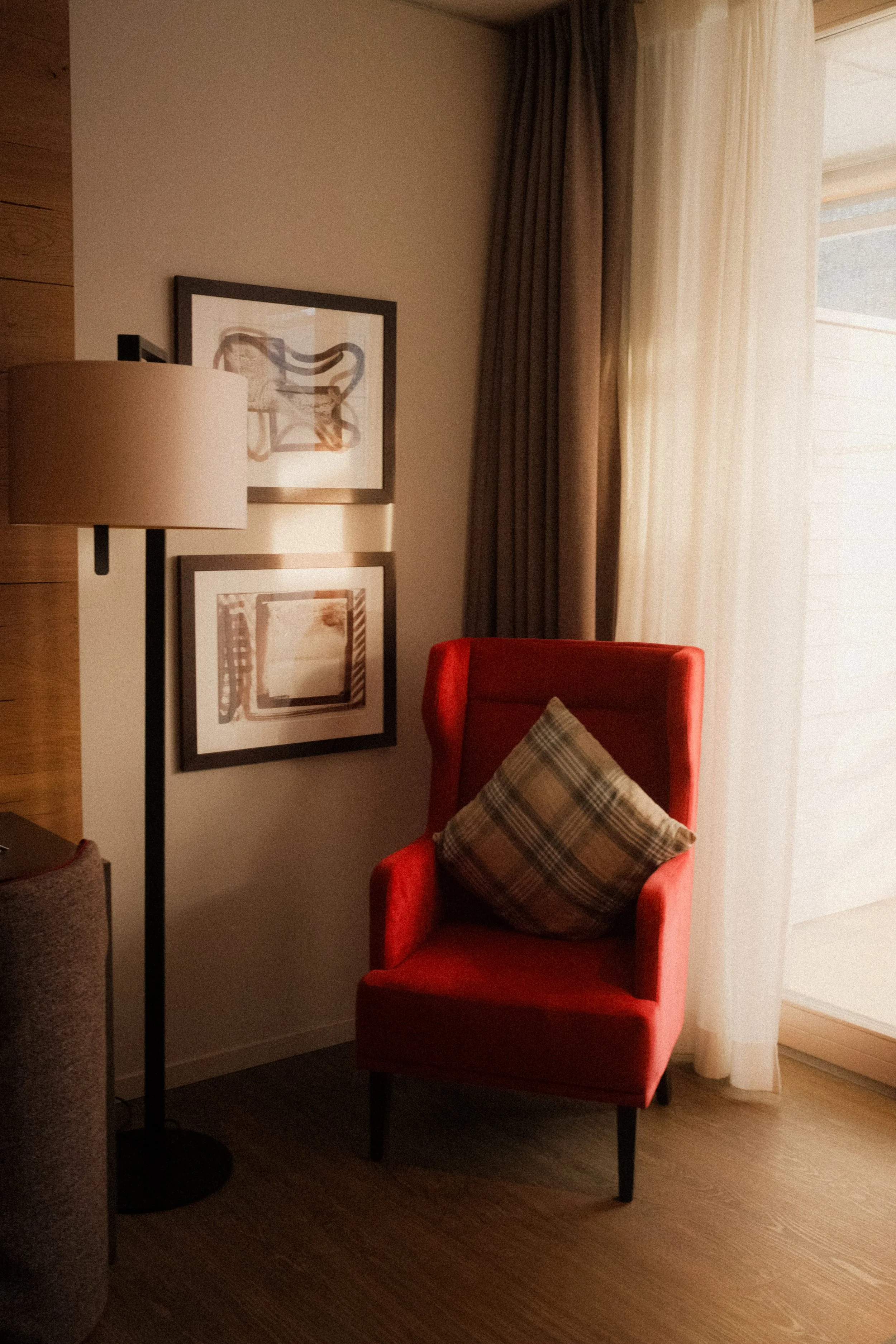 switzerland-alpine-hotel-room-red-velvet-armchair-cozy-hospitality-photography-27.jpg