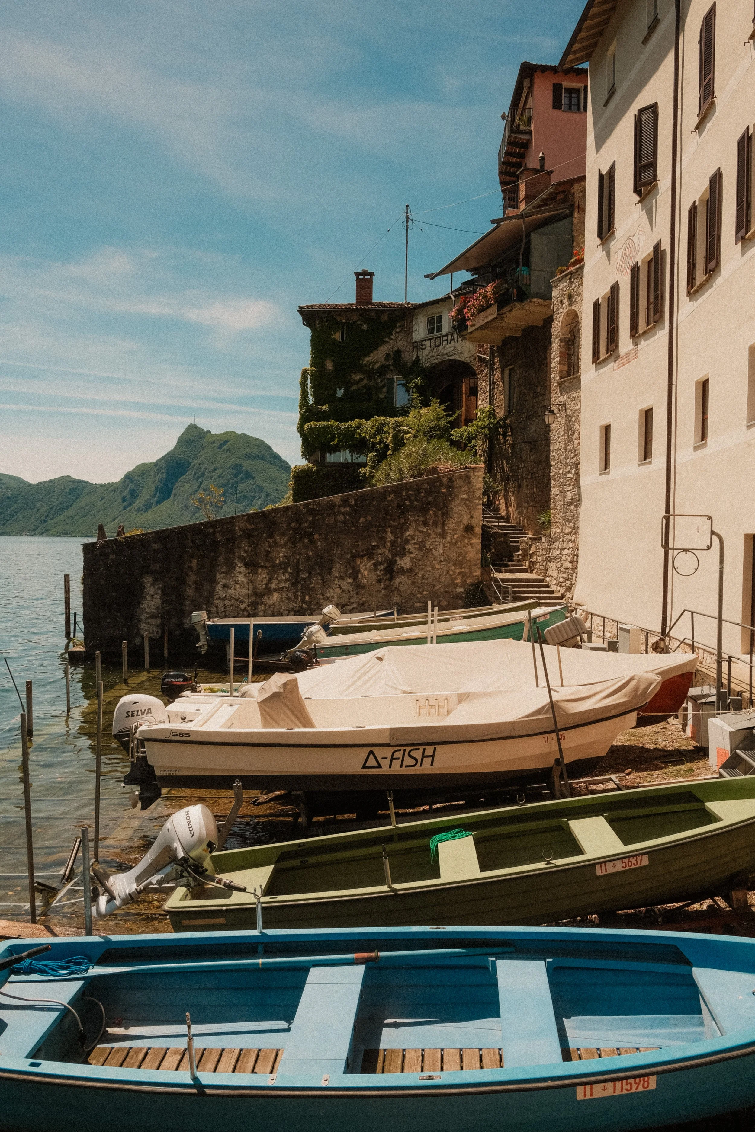 lake-lugano-switzerland-village-colorful-fishing-boats-waterfront-travel-photography-50.jpg