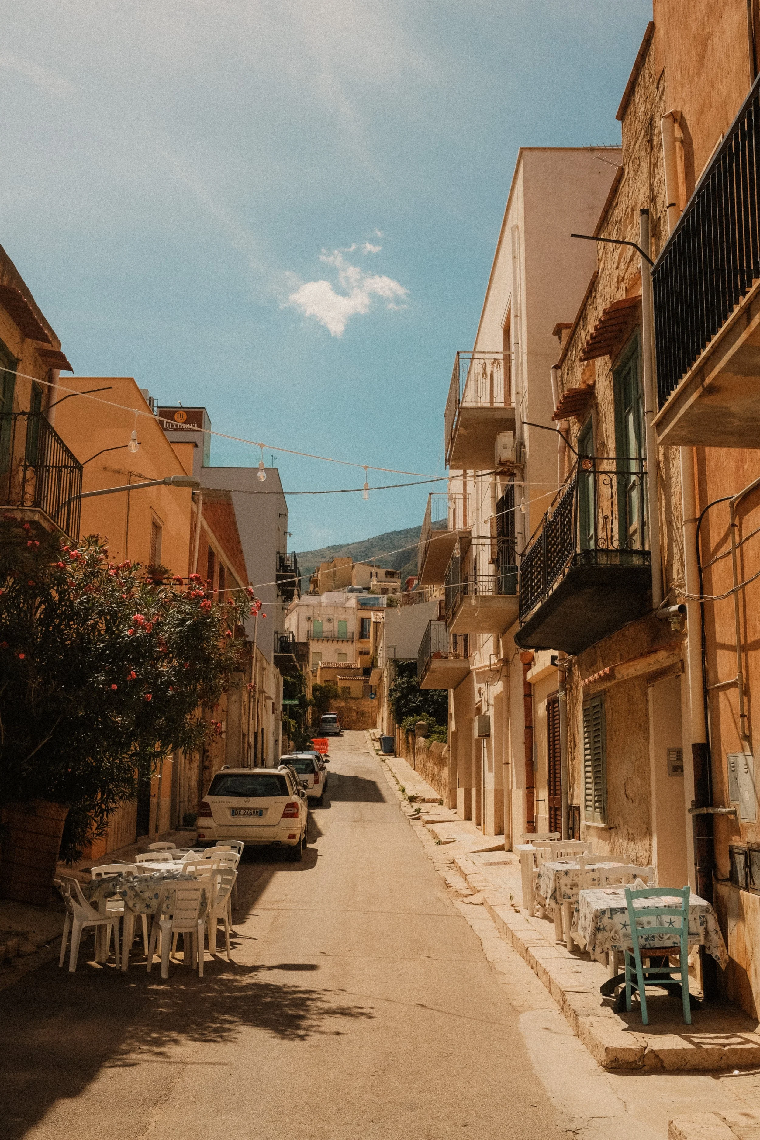 sicily-village-street-outdoor-restaurant-balcony-travel-photography-14.jpg