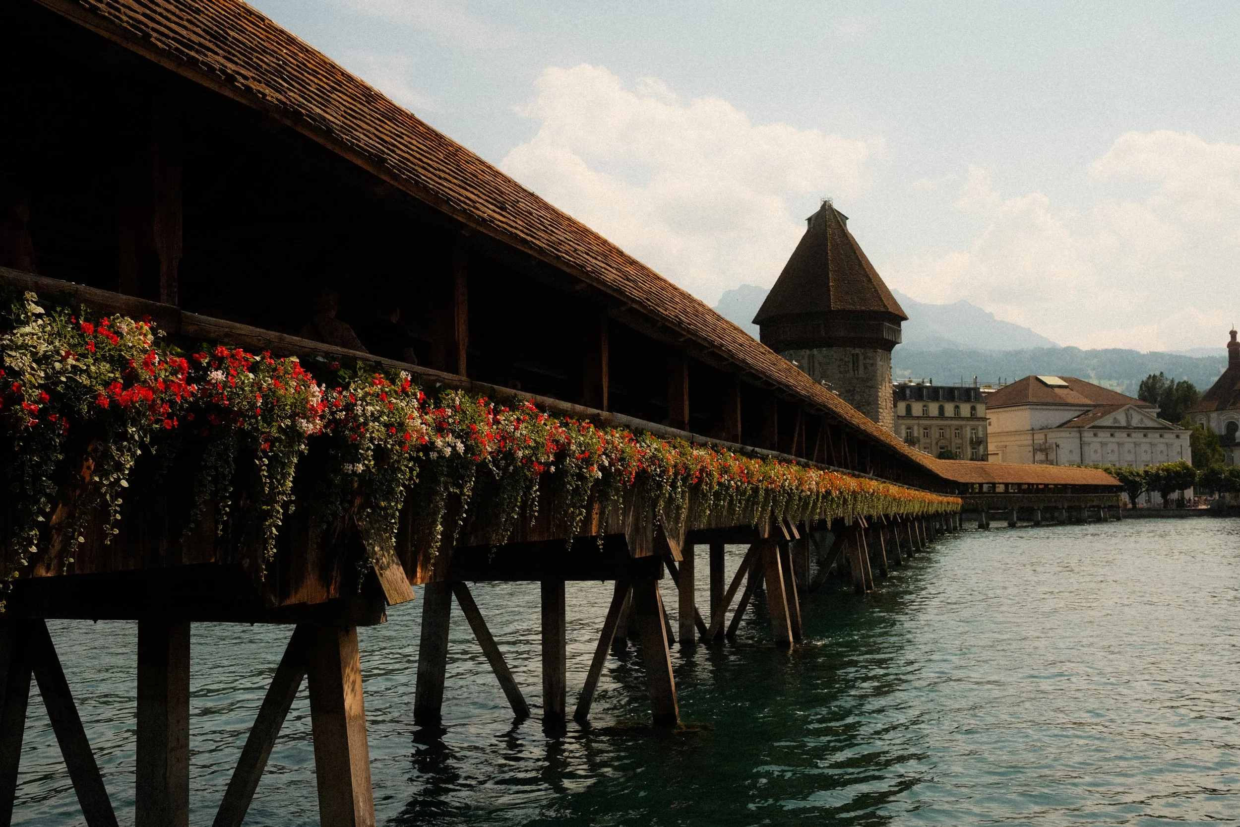 lucerne-switzerland-chapel-bridge-flowers-water-tower-travel-photography-03.jpg