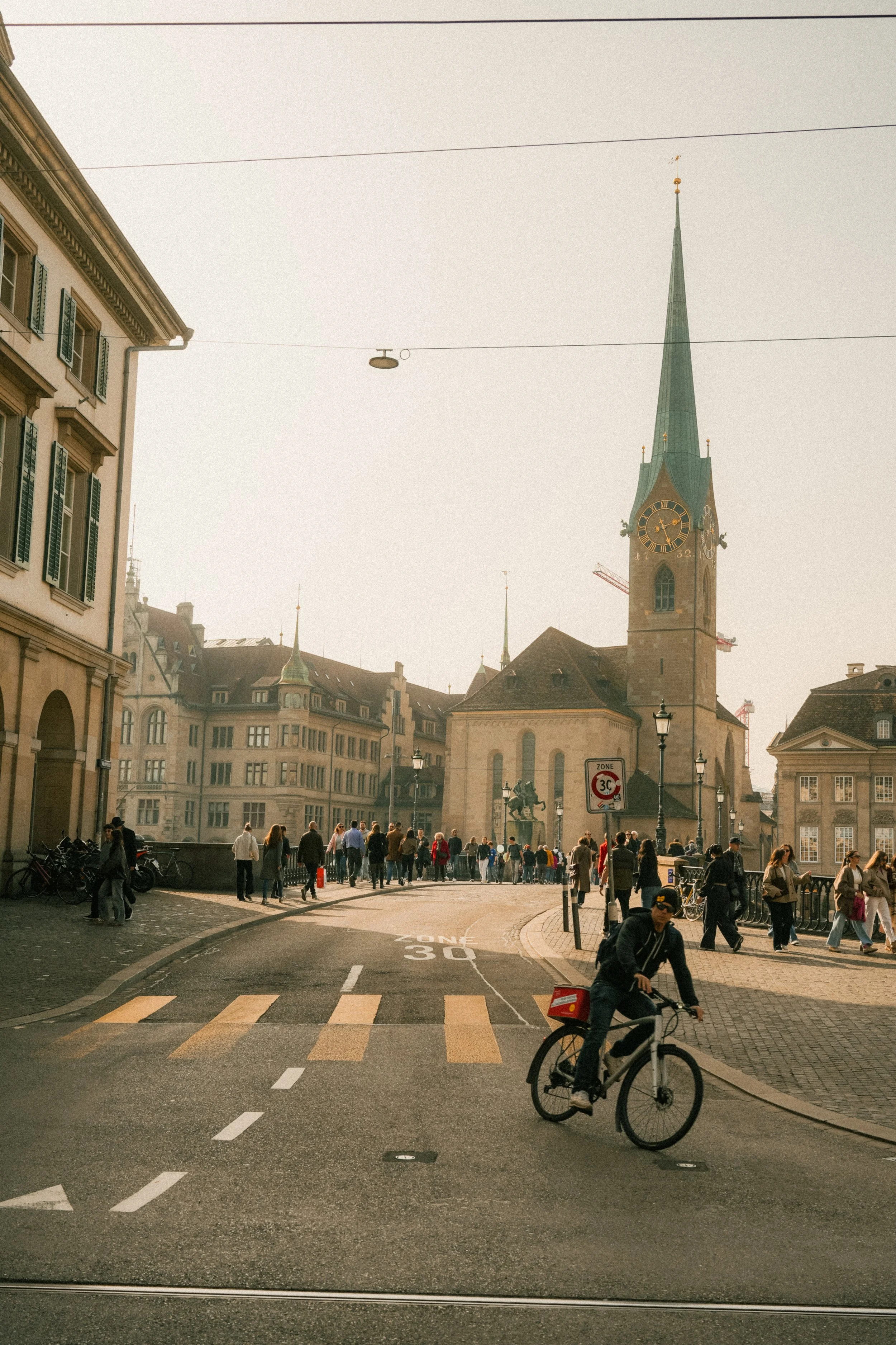 switzerland-zurich-fraumunster-church-cyclist-street-travel-photography-05.jpg