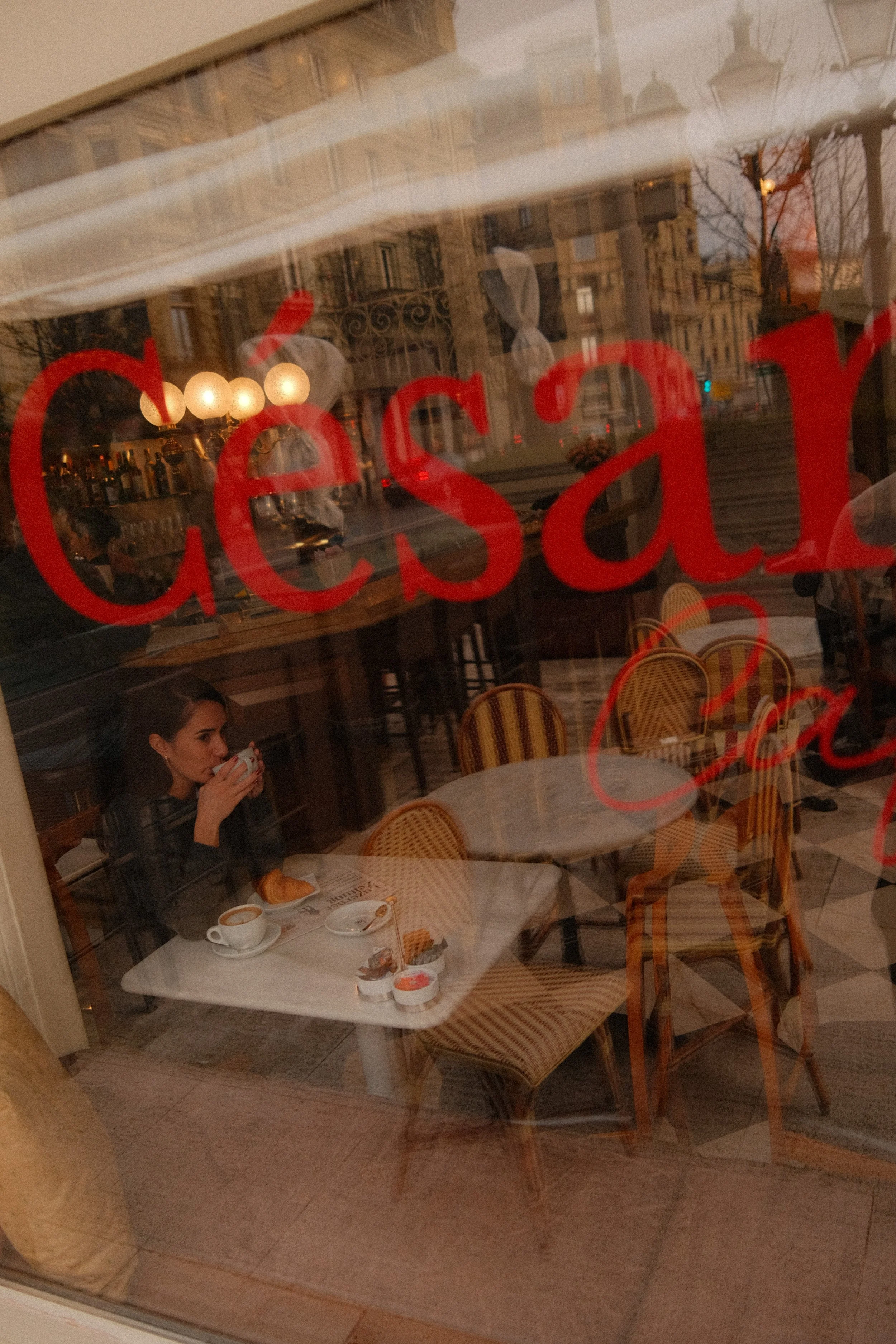 grand-hotel-national-lucerne-switzerland-cesar-bar-woman-coffee-croissant-window-hospitality-photography-17.jpg