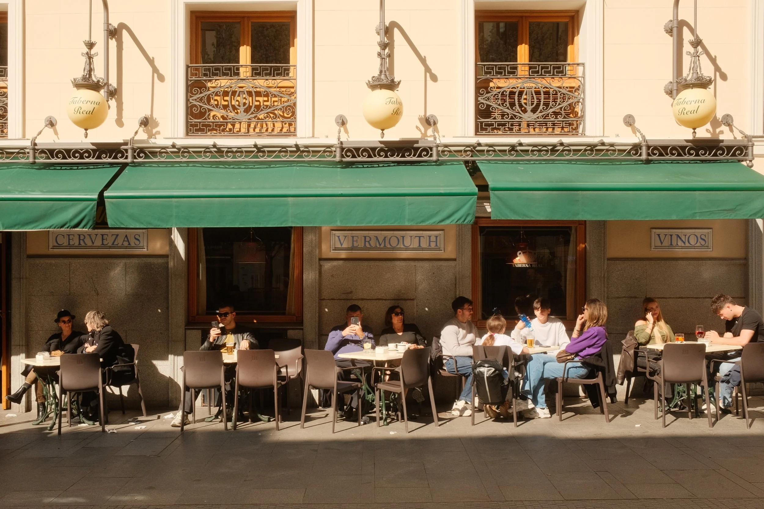 madrid-spain-cerveceria-vermouth-outdoor-dining-green-awning-travel-photography-27.jpg