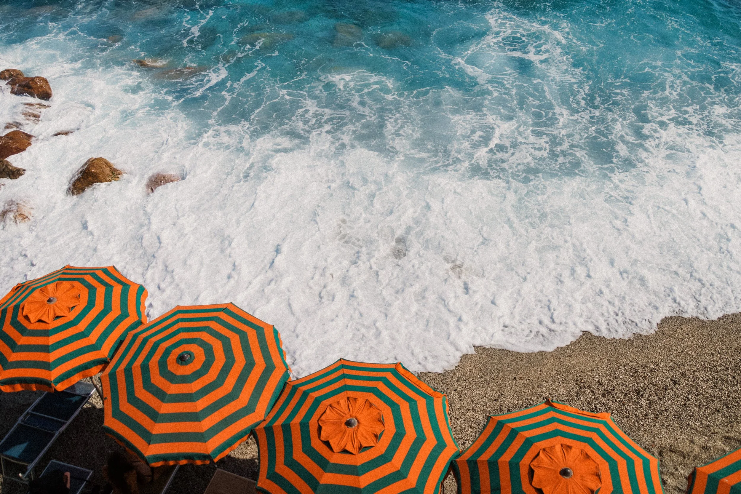 cinque-terre-italy-beach-umbrellas-aerial-ocean-summer-travel-photography-08.jpg