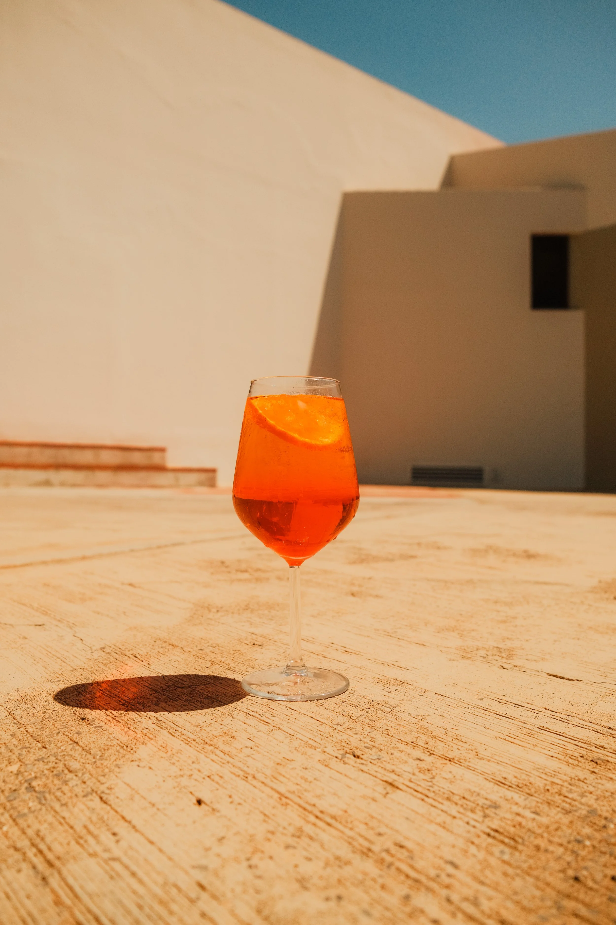 agapi-beach-resort-crete-greece-aperol-spritz-cocktail-white-architecture-summer-hospitality-photography-29.jpg