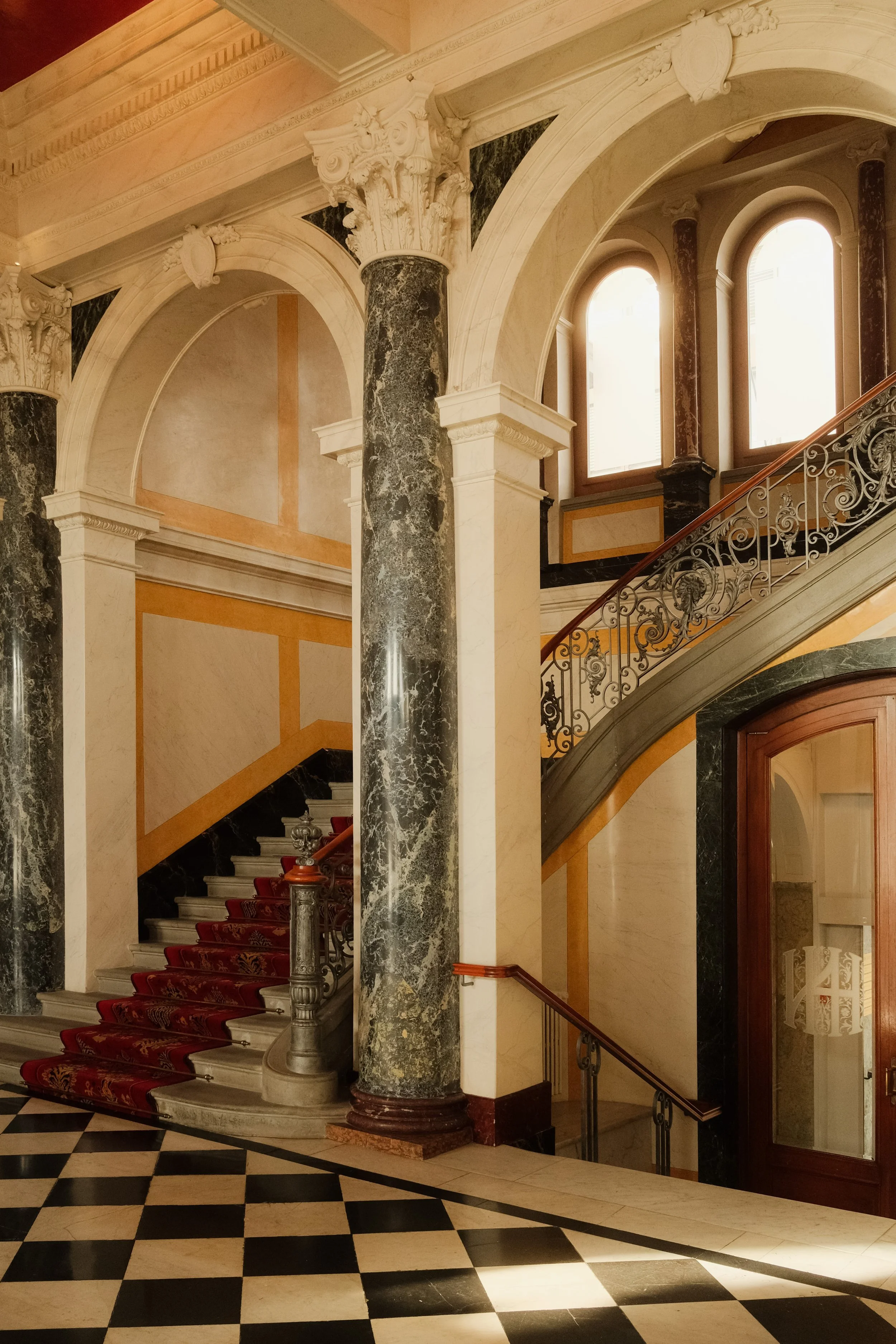 grand-hotel-national-lucerne-switzerland-hotel-lobby-marble-columns-grand-staircase-checkered-floor-hospitality-photography-11.jpg