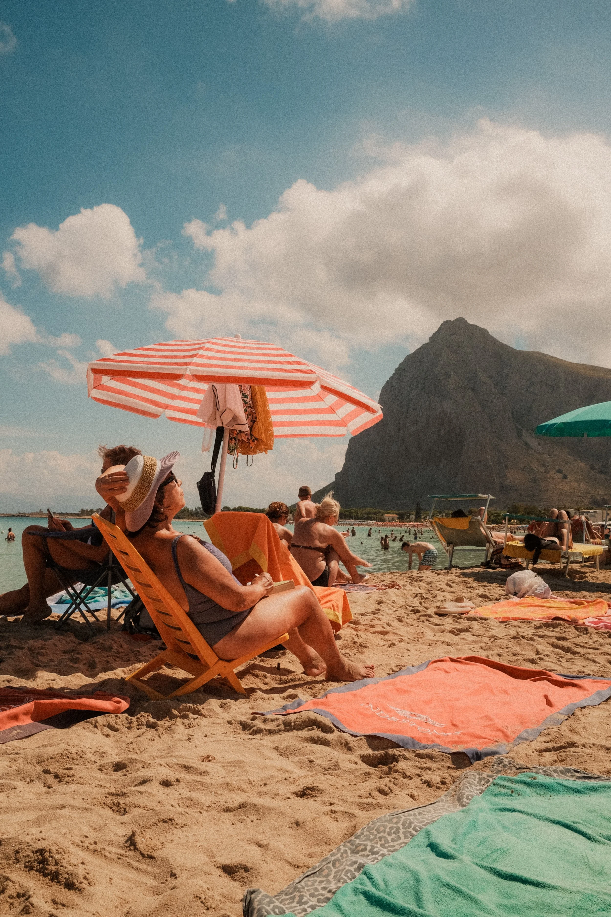 san-vito-lo-capo-sicily-beach-umbrella-mountain-summer-travel-photography-03.jpg