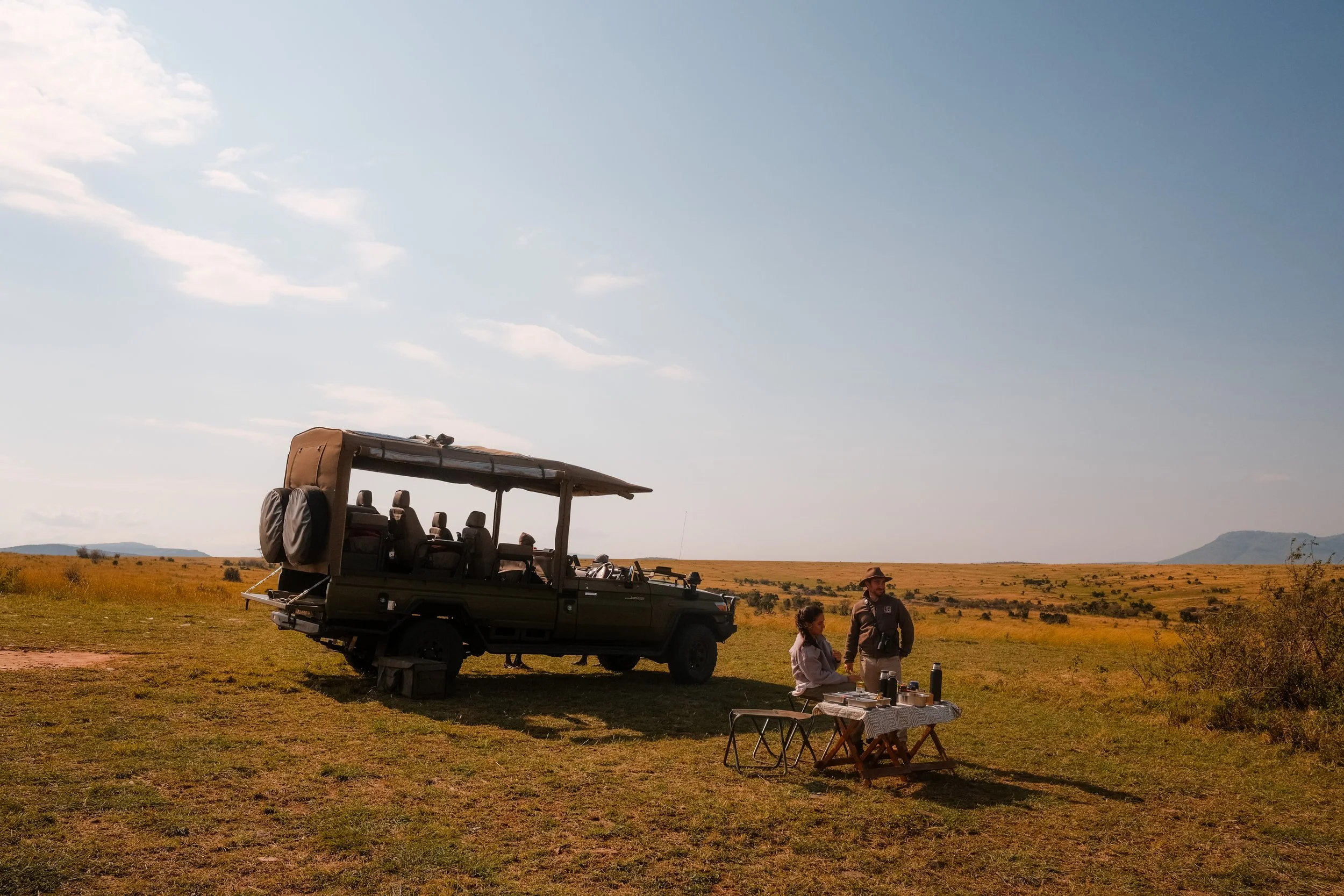 enkewa-safari-camp-masai-mara-kenya-bush-sundowners-safari-vehicle-savanna-hospitality-photography-13.jpg