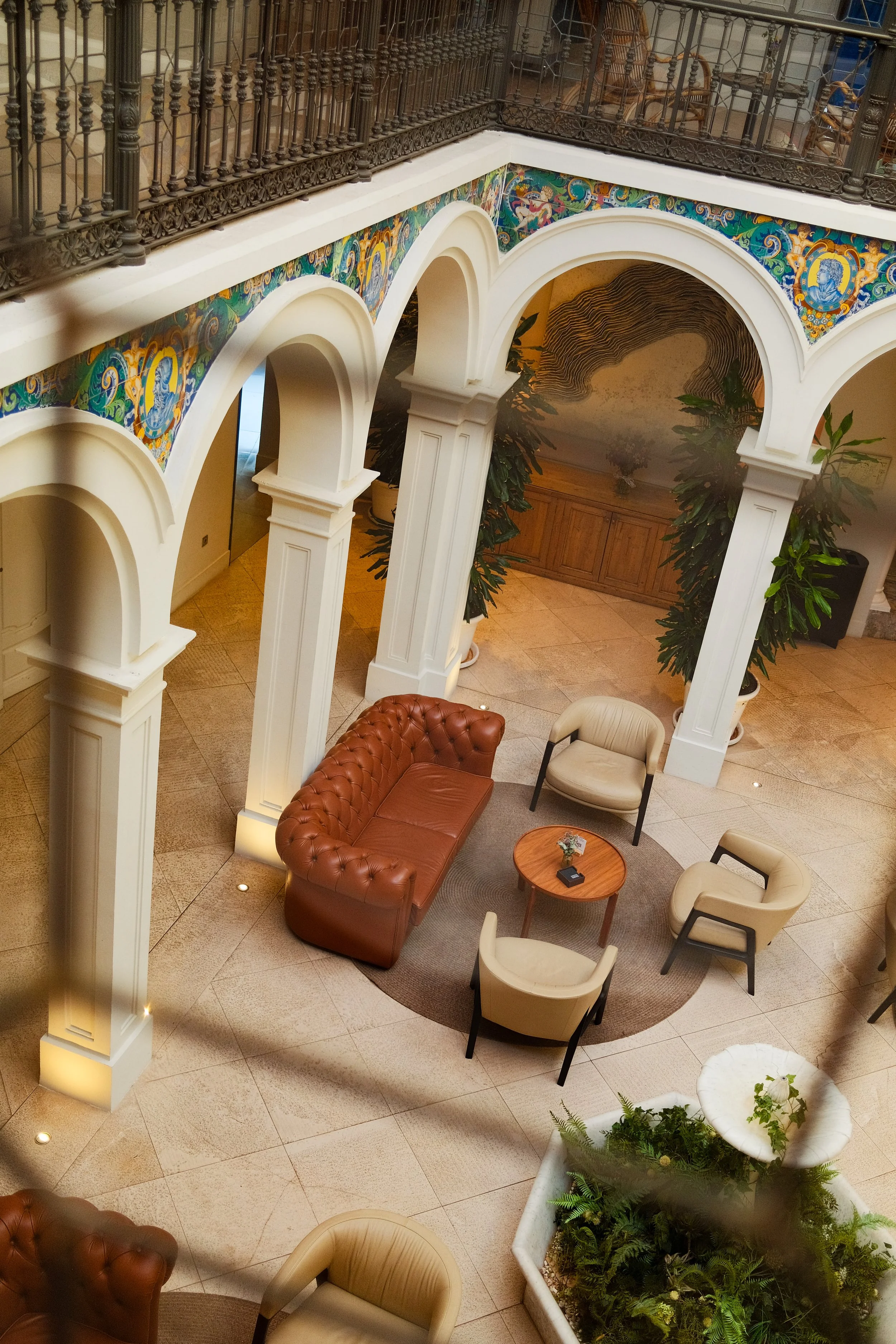 courtyard-arches-lounge-aerial-h10-palacio-colomera.jpg