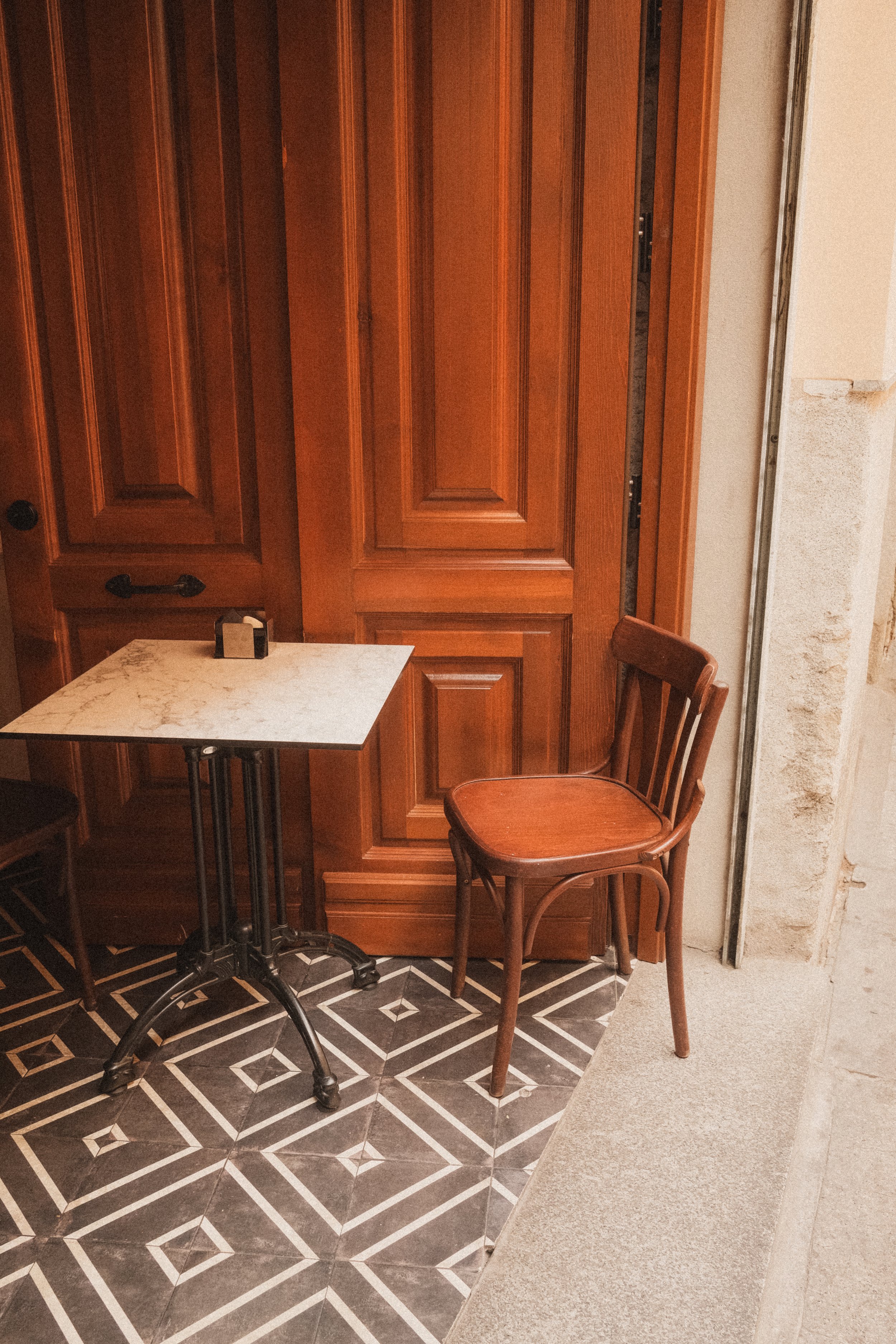 madrid-spain-cafe-bistro-table-wooden-door-tile-floor-travel-photography-08.jpg