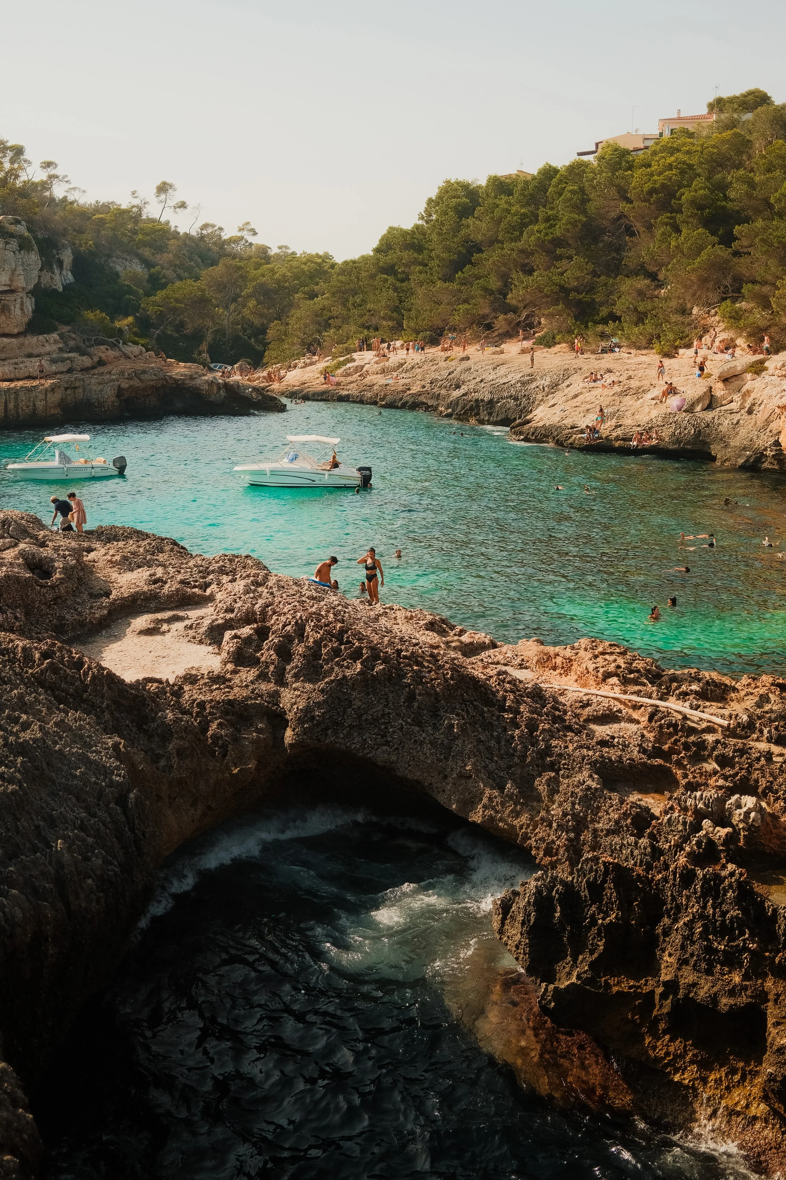 mallorca-rocky-cove-natural-arch-turquoise-water-boats-swimmers-travel-photography-04.jpg