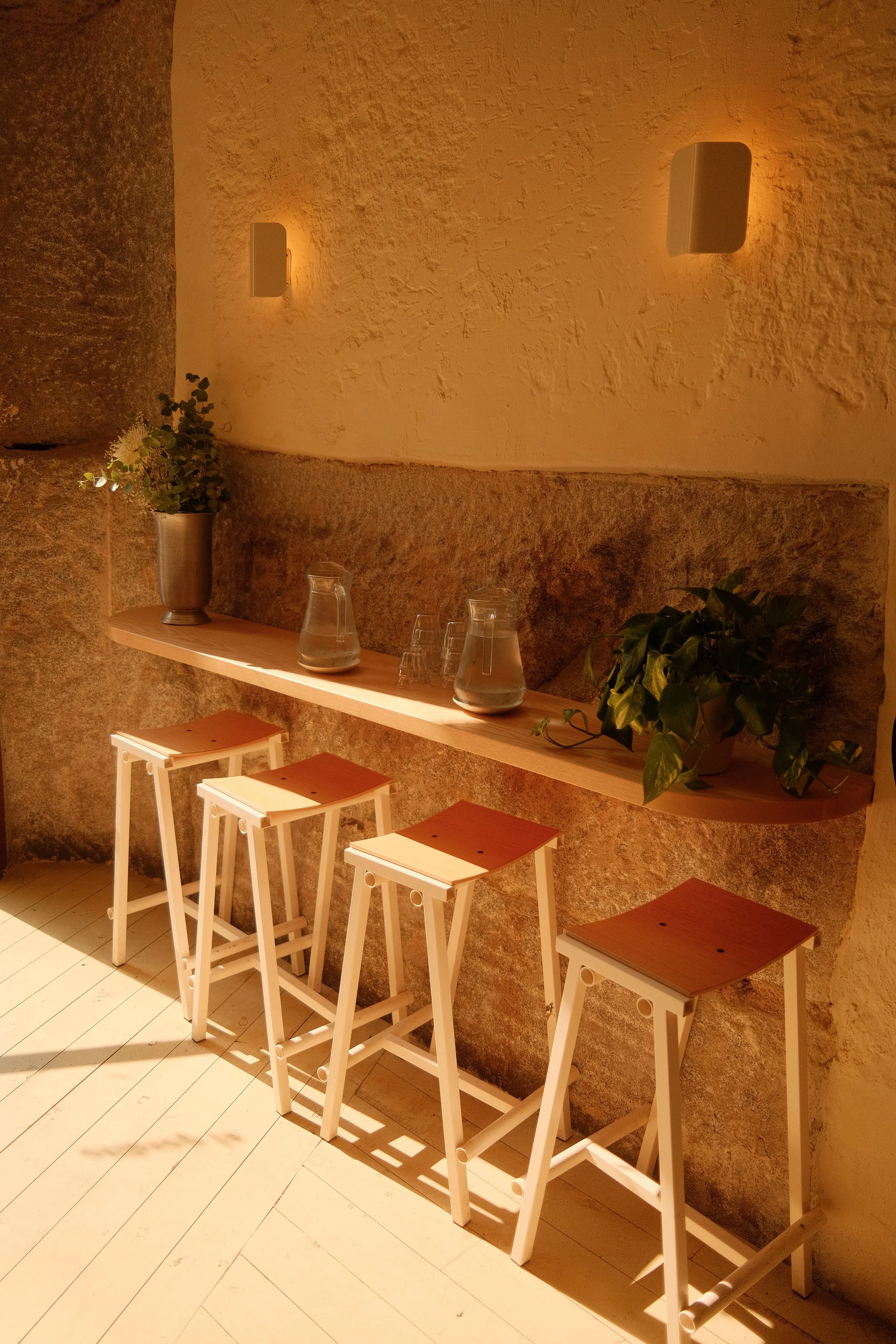 madrid-spain-bar-interior-stone-wall-bar-stools-sconces-travel-photography-09.jpg