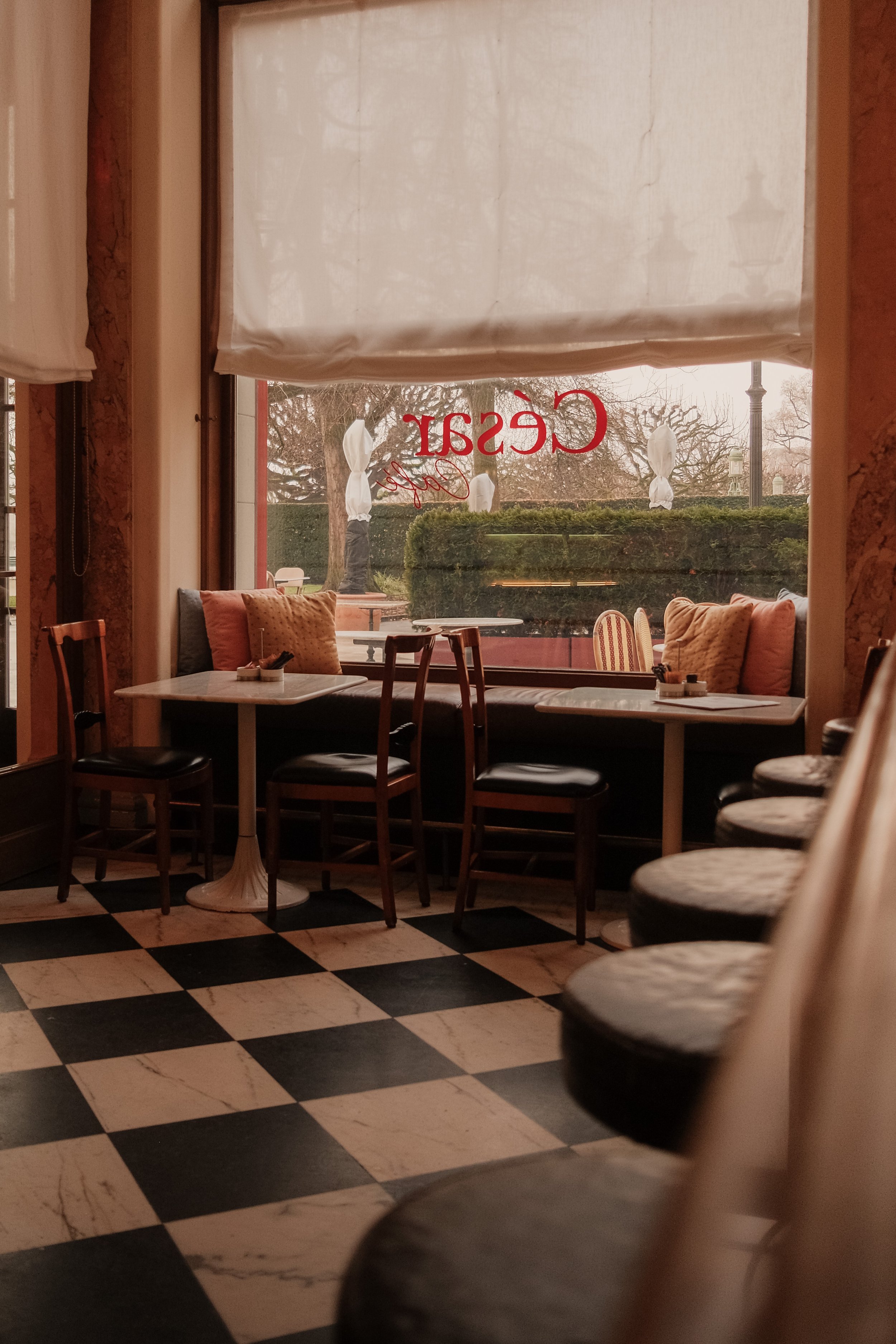 grand-hotel-national-lucerne-switzerland-cesar-bar-checkered-floor-banquette-hospitality-photography-16.jpg
