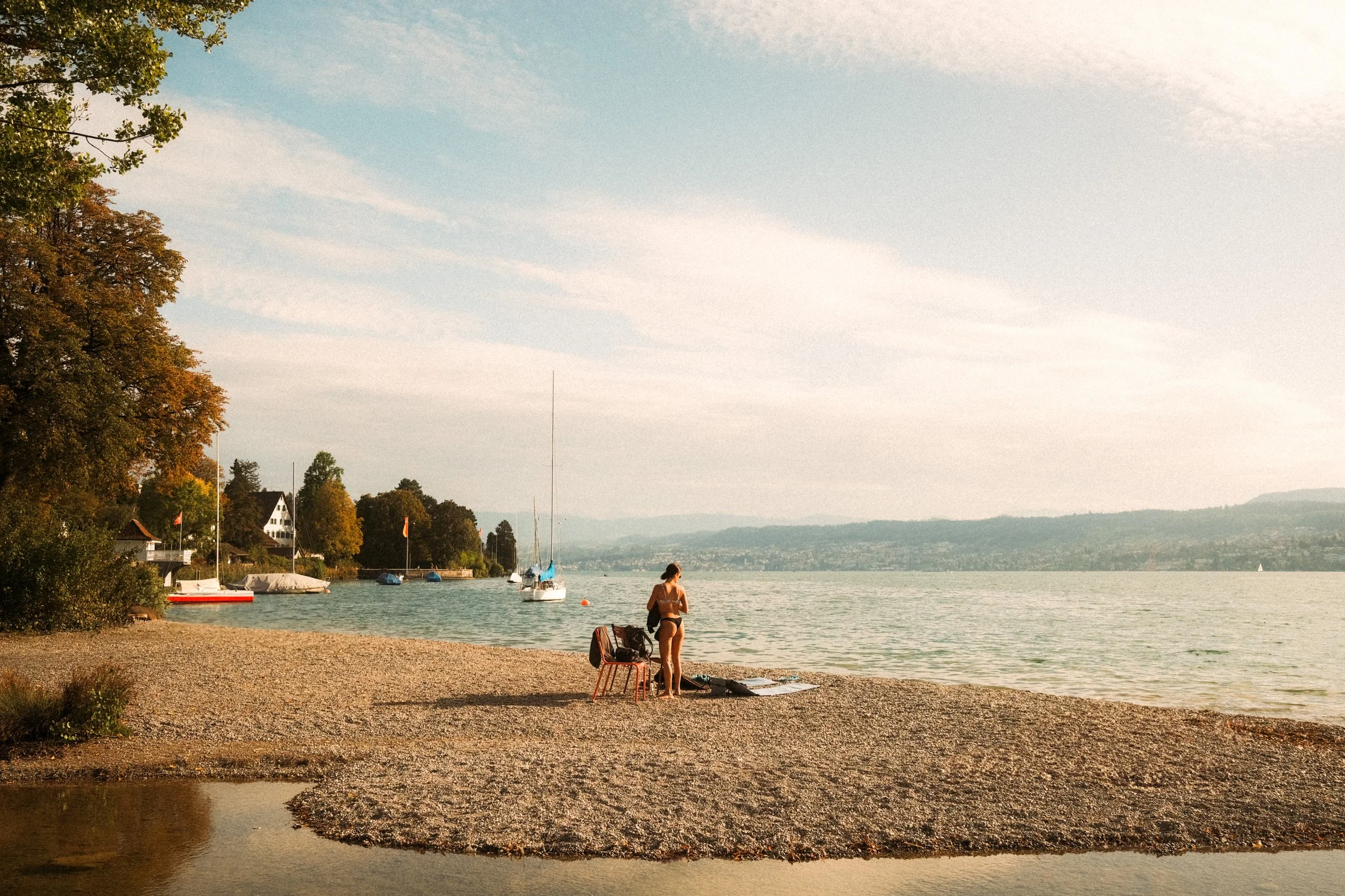 zurich-switzerland-lake-beach-woman-sailboat-summer-travel-photography-17.jpg