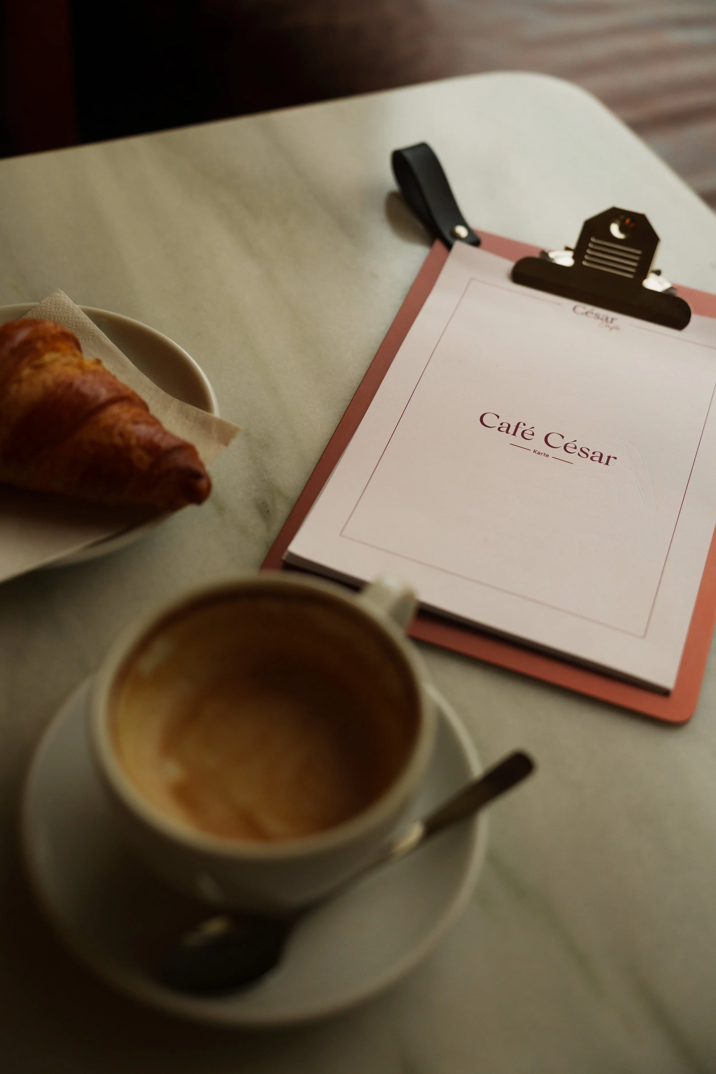 grand-hotel-national-lucerne-switzerland-cafe-cesar-coffee-croissant-menu-marble-table-hospitality-photography-31.jpg