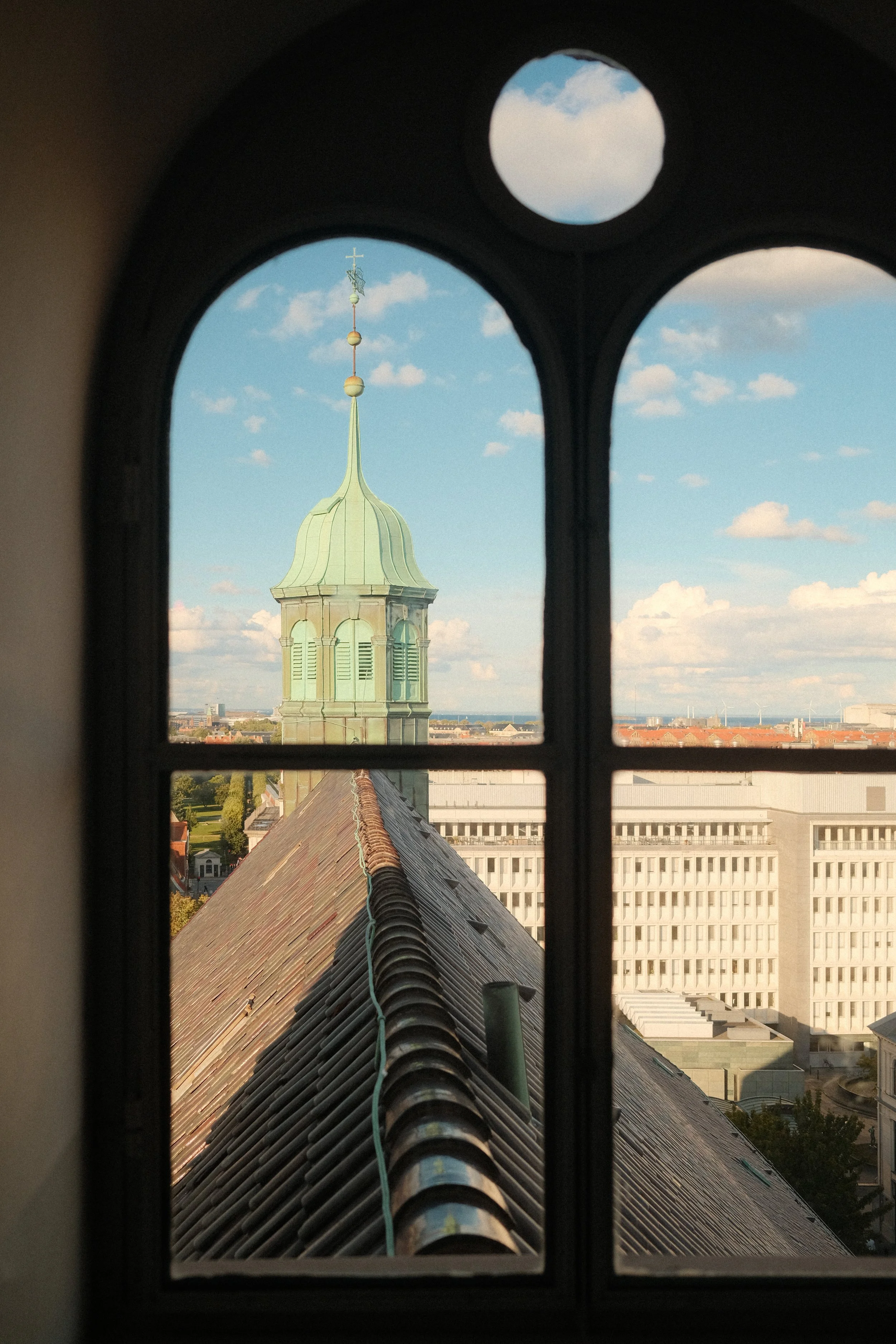 copenhagen-rooftop-copper-tower-arch-window-travel-photography-05.jpg