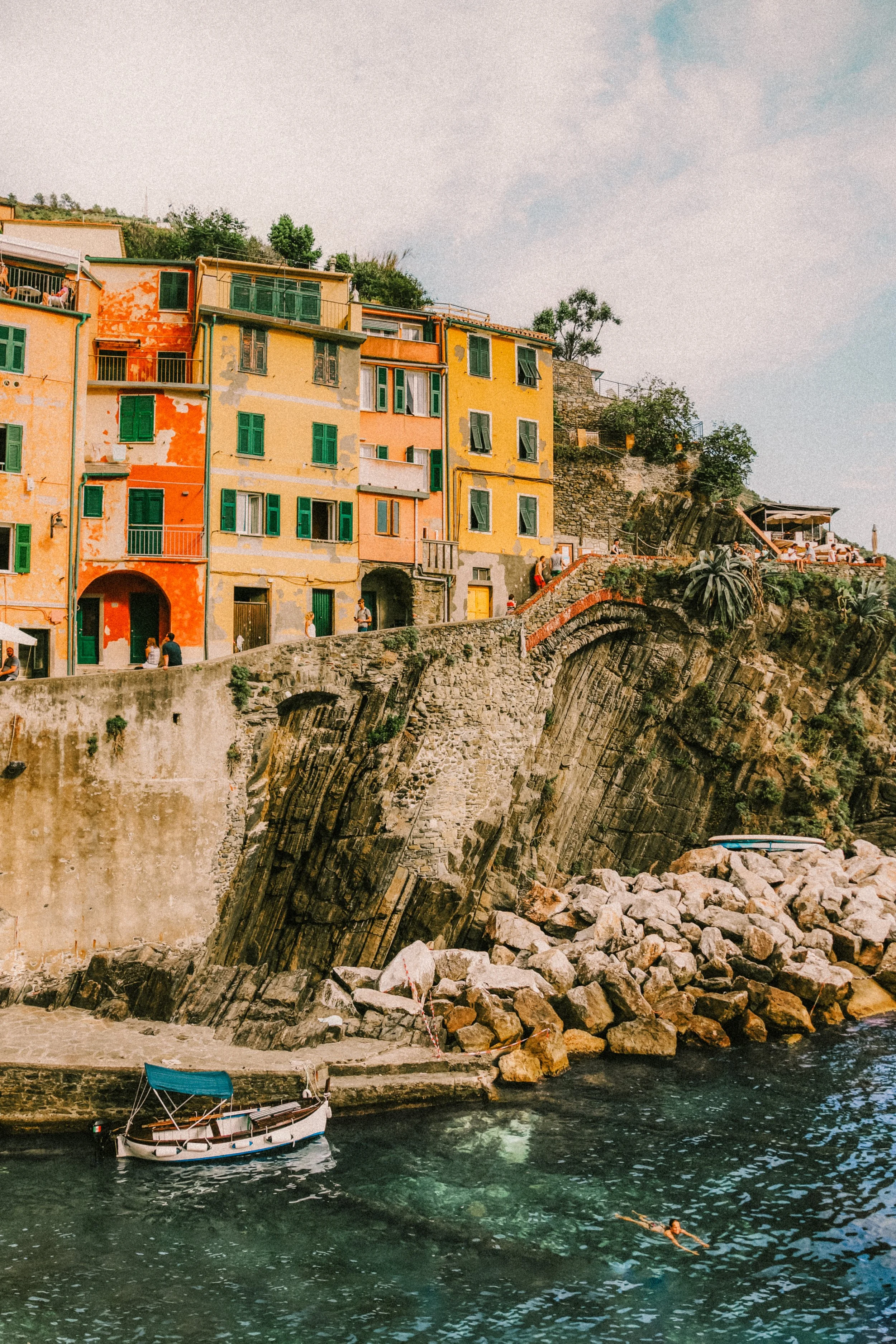 cinque-terre-italy-colorful-buildings-cliff-harbor-boat-travel-photography-03.jpg