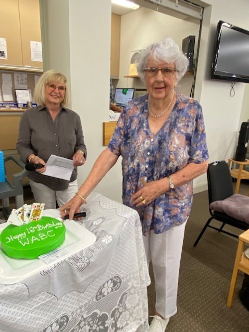 Sylvia Bray and Helen George (Patron) with the Anniversary Cake.jpg