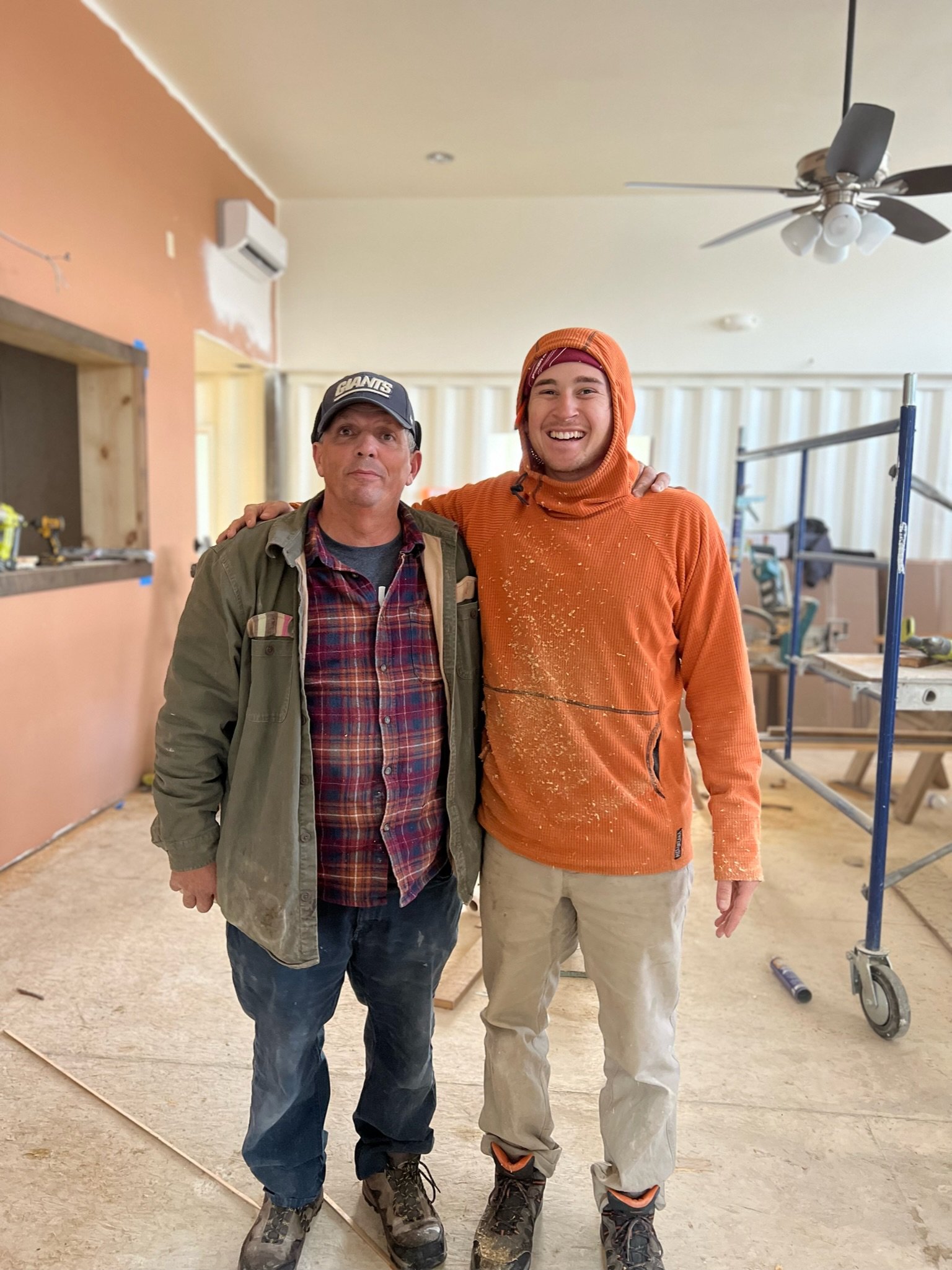 Kevin wanted us to take a picture with all the sawdust on my jacket to show we were working hard