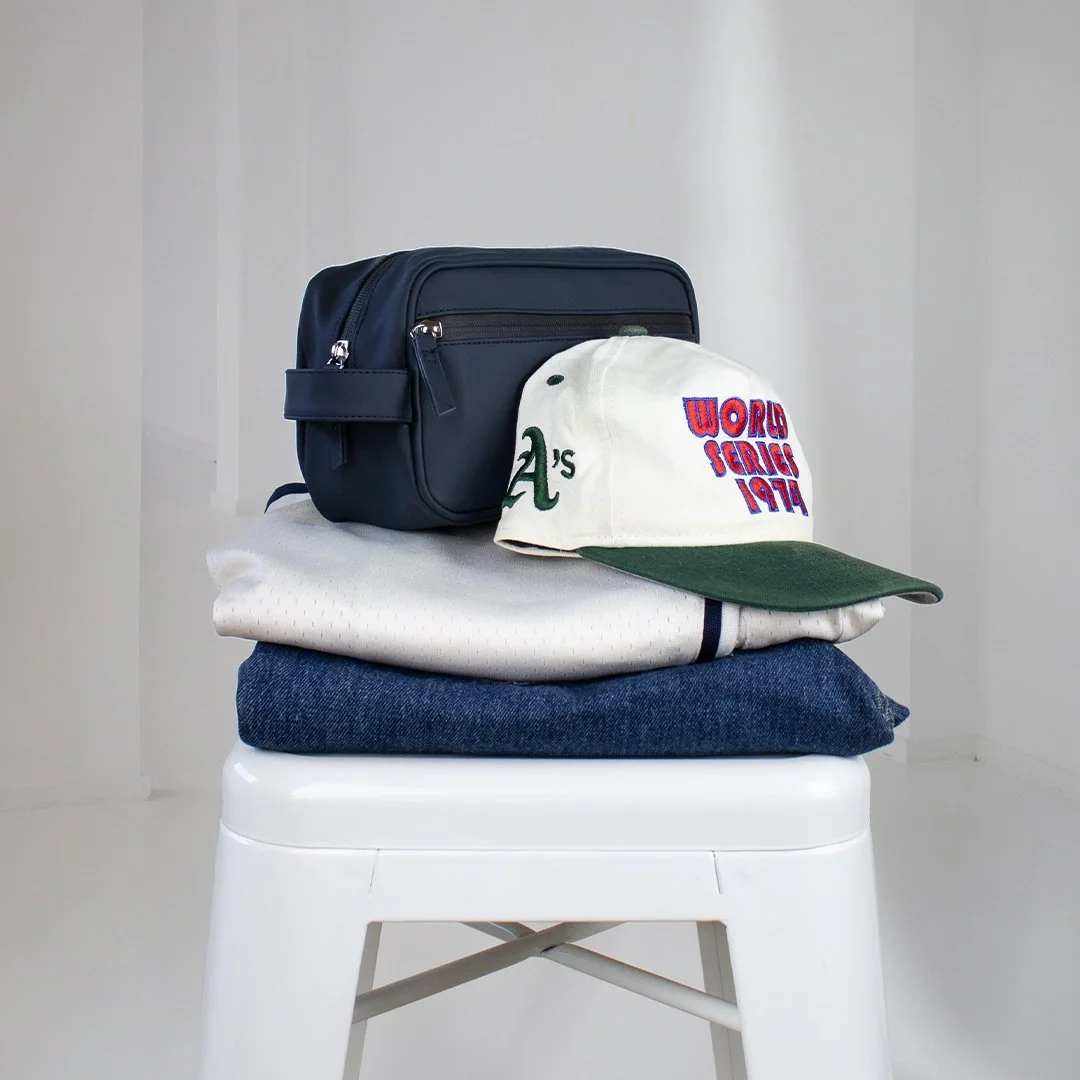 Stylised Cosmetic Bag and Clothing On Stool