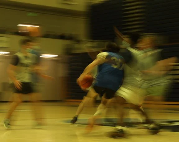 Ethan Sterkel, Bellingham, Washington, cuts through the lane in the intramural semifinal game on Nov. 14, 2021. 