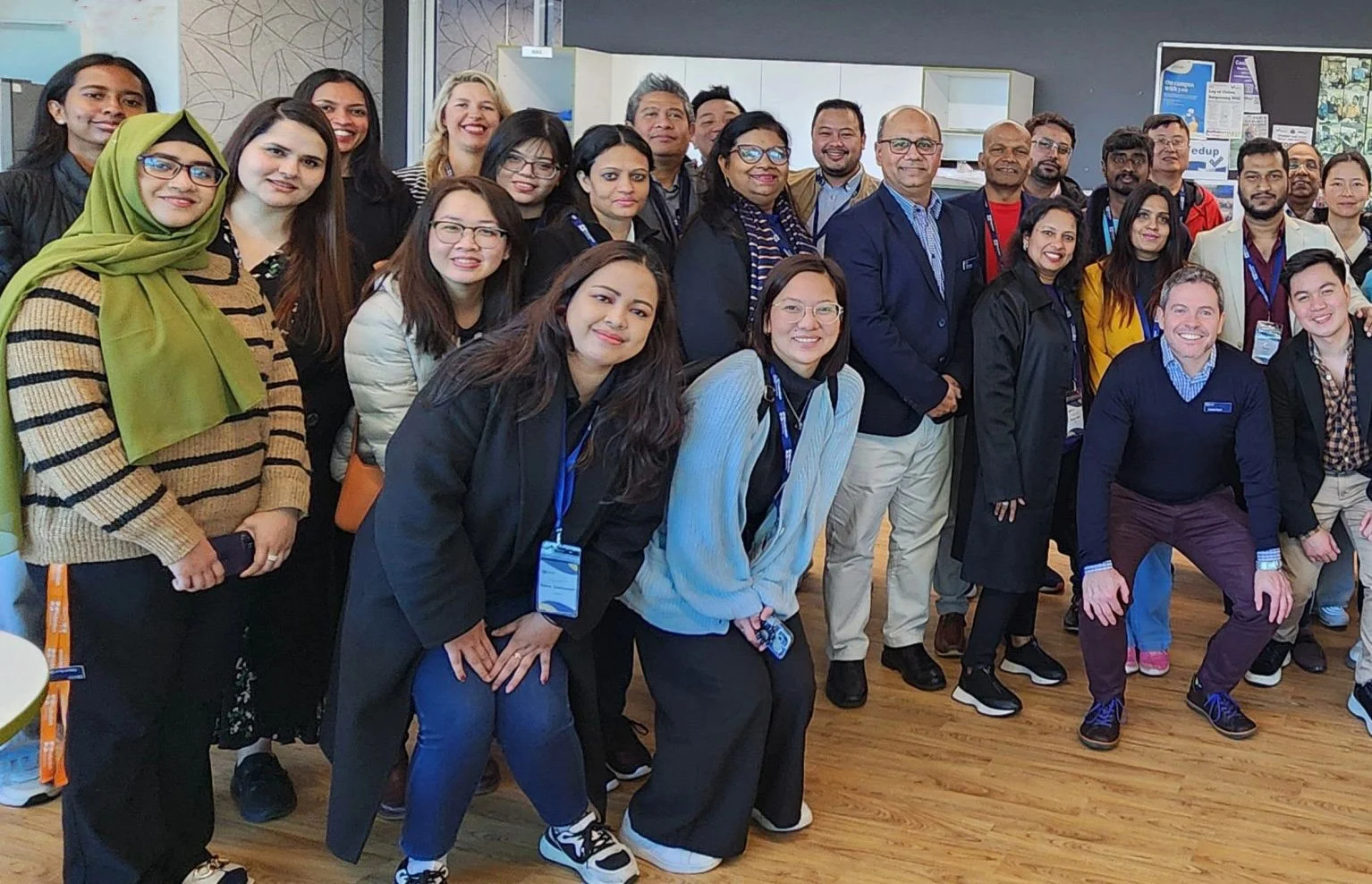 Group photo of colleagues and students at an academic event at Federation University Australia in 2024.