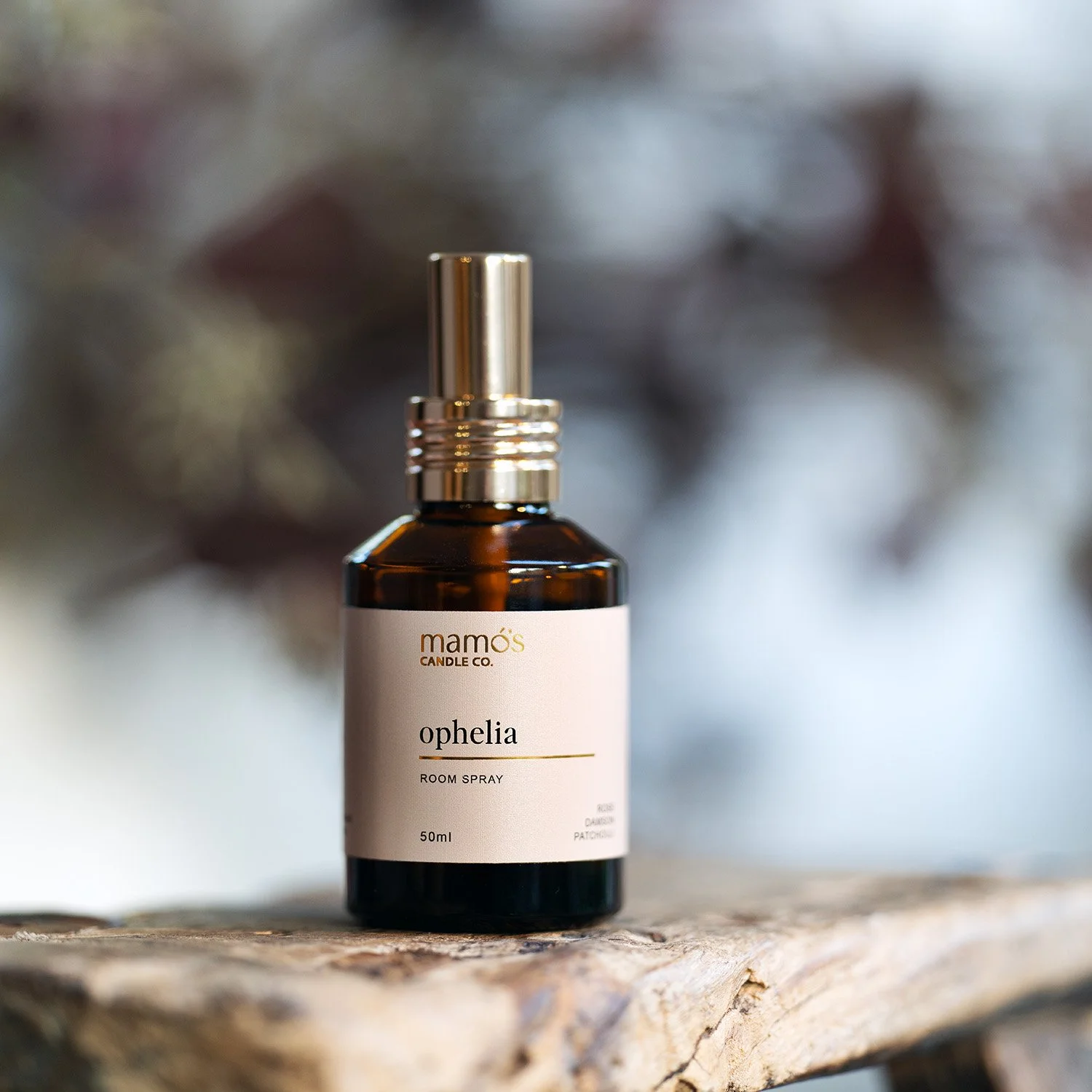 Ophelia | Room Spray 50ml. Amber bottle with gold spray top and cap.