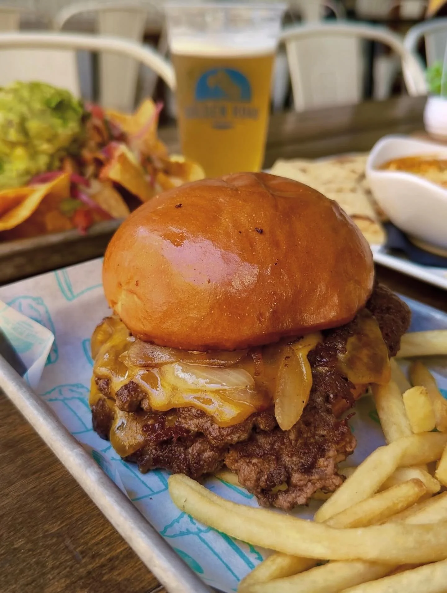 Burgers, fries, and a cold one @goldenroadpubhb that&rsquo;s the Peter&rsquo;s Landing trifecta 🍔🍺🍟