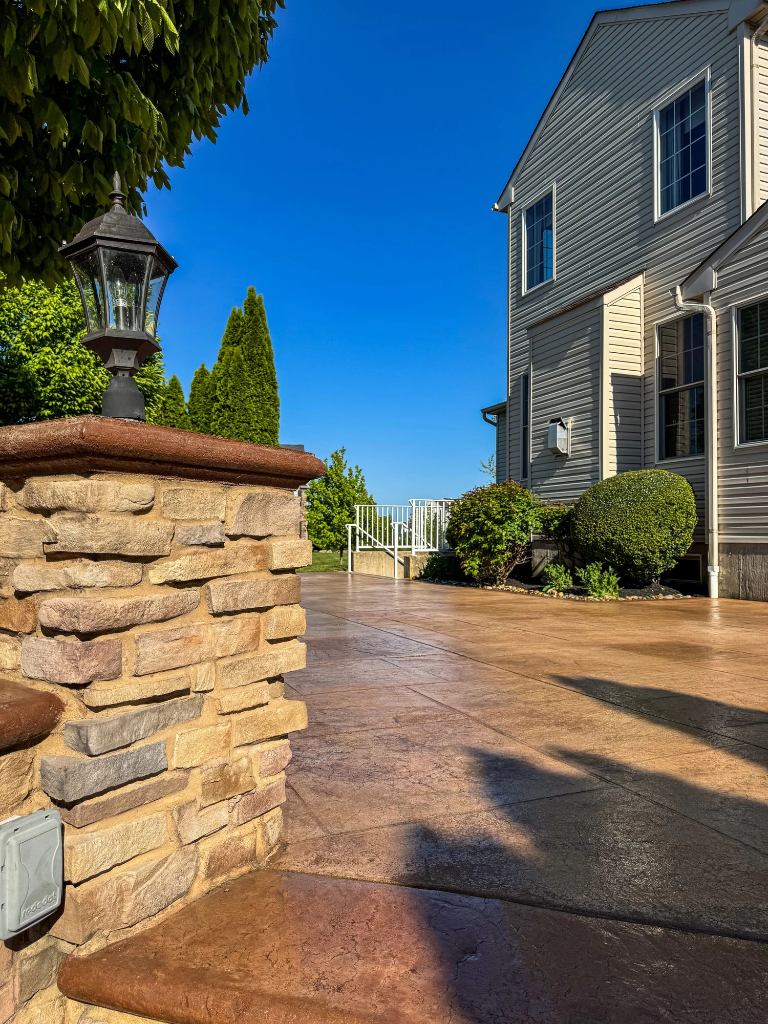 Finished high-end stamped concrete that looks like real stone with no weeds, joints, or shifting, Cape May NJ by Patrick Breen Masonry & Concrete