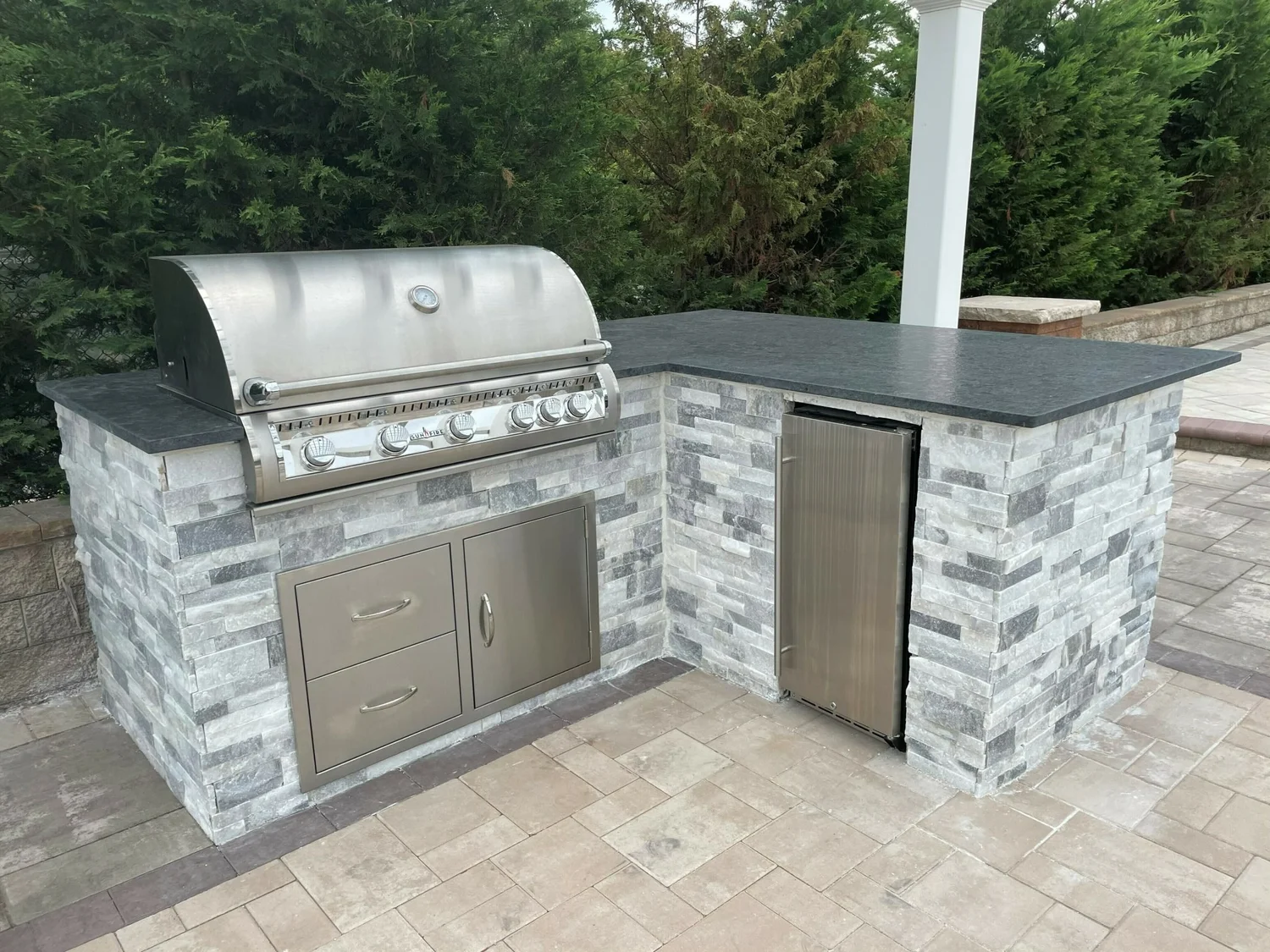 Custom outdoor kitchen built on stamped concrete in South Jersey by Patrick Breen Masonry & Concrete