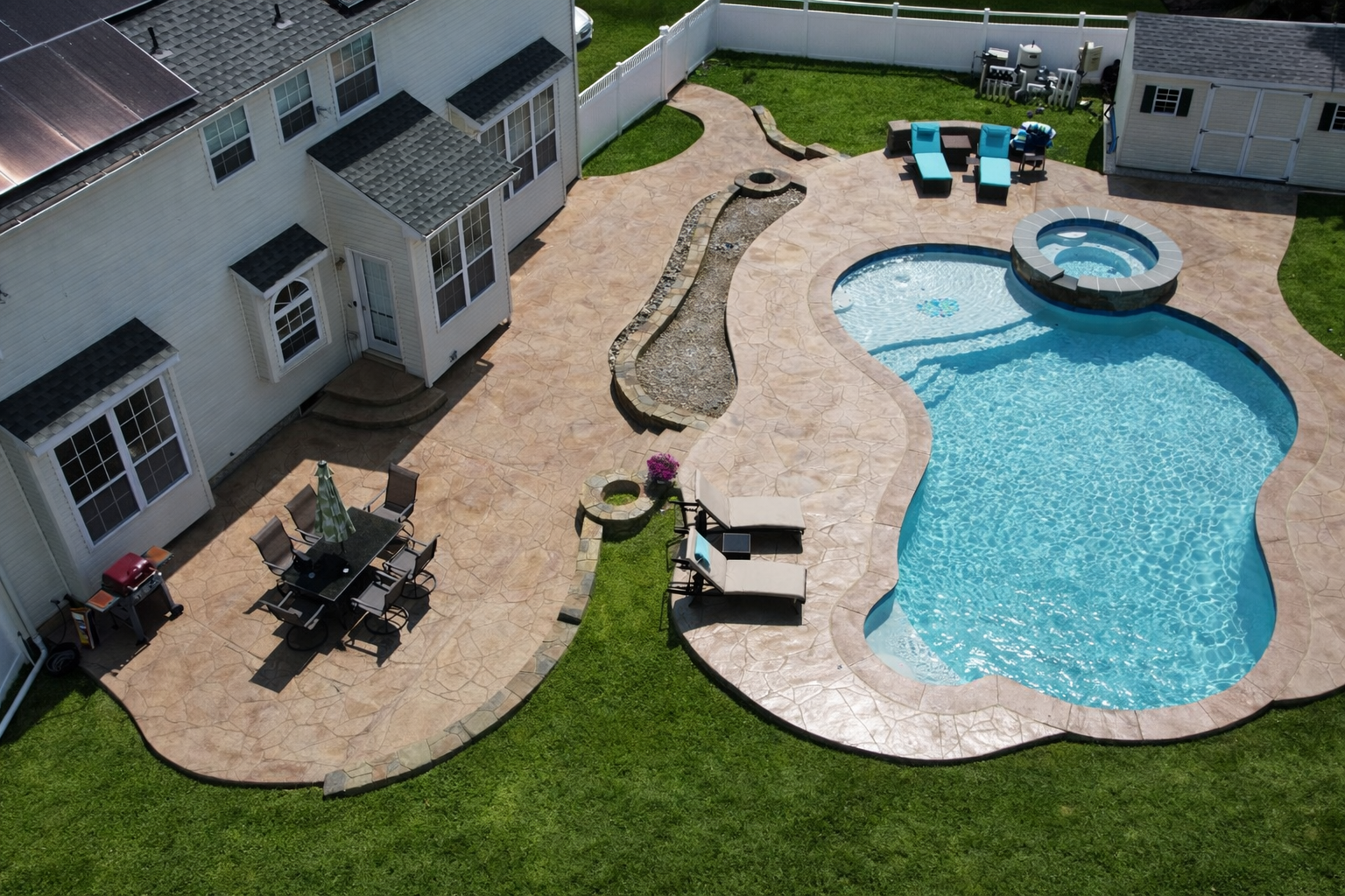 Custom stamped concrete pool deck design in South Jersey