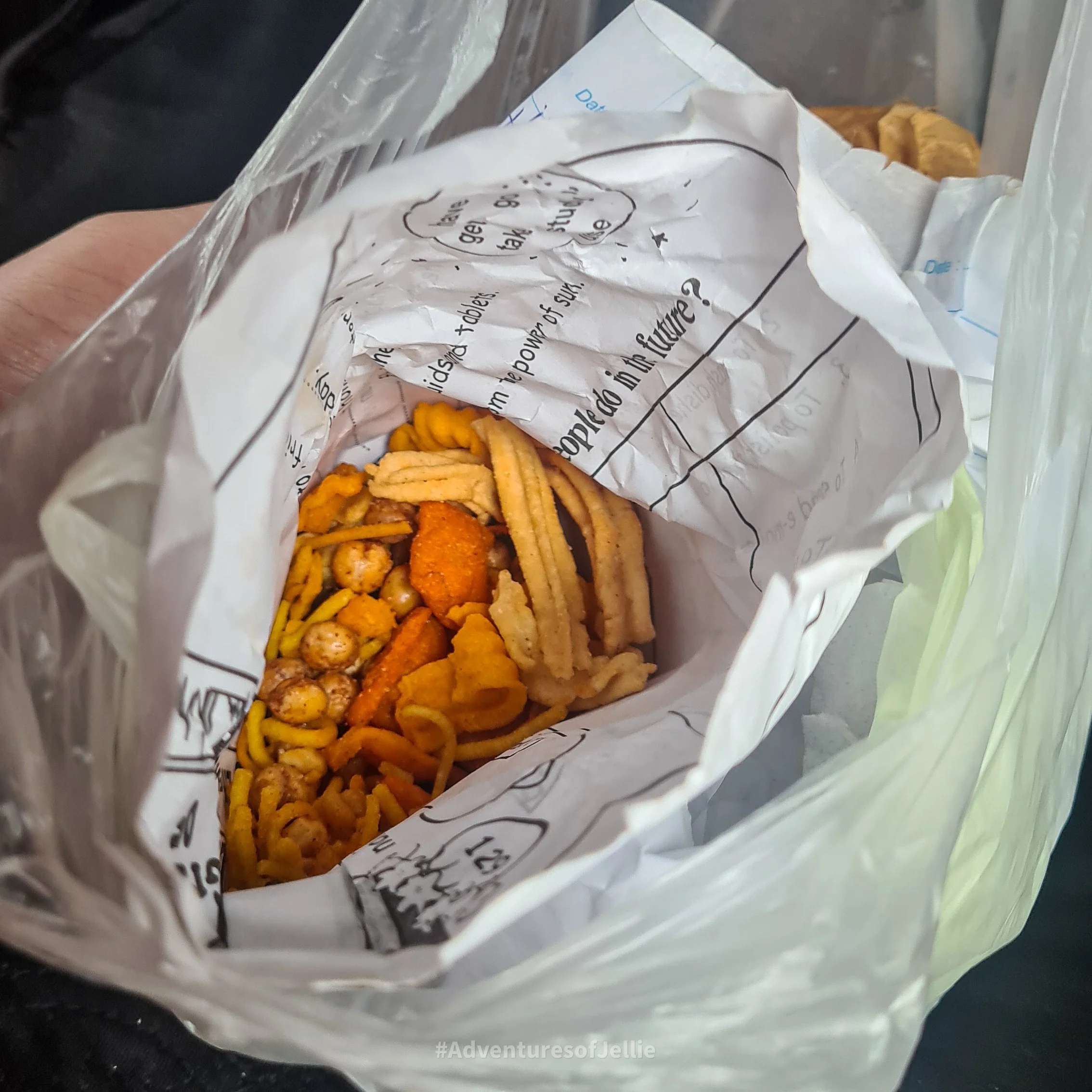 A bag of assorted savoury fried snacks brought in a store outside of Kandy's market.