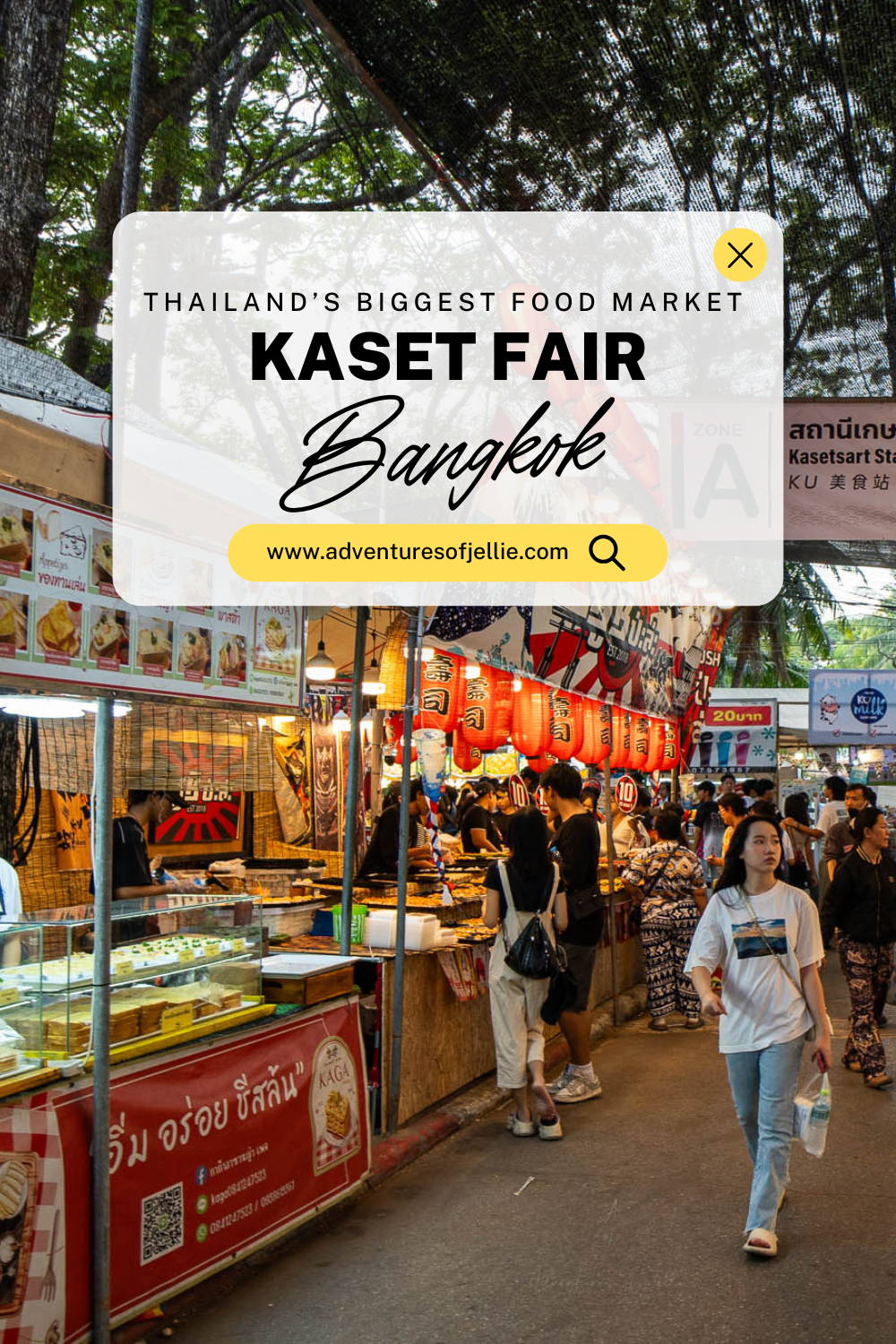 The Adventures Of Jellie pin for the article: Thailand's Biggest Food Market - Kaset Fair, Bangkok. Featuring a busy street food market scene full of people buying street food.