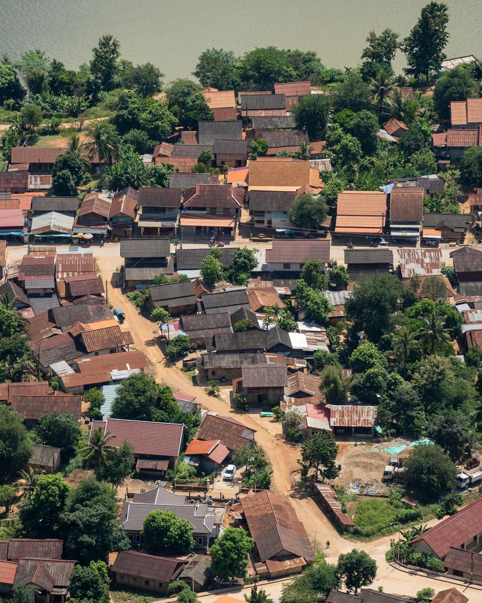 A top down view over the town of Nong Khiaw taken from the top of the Sleeping Lady viewpoint.