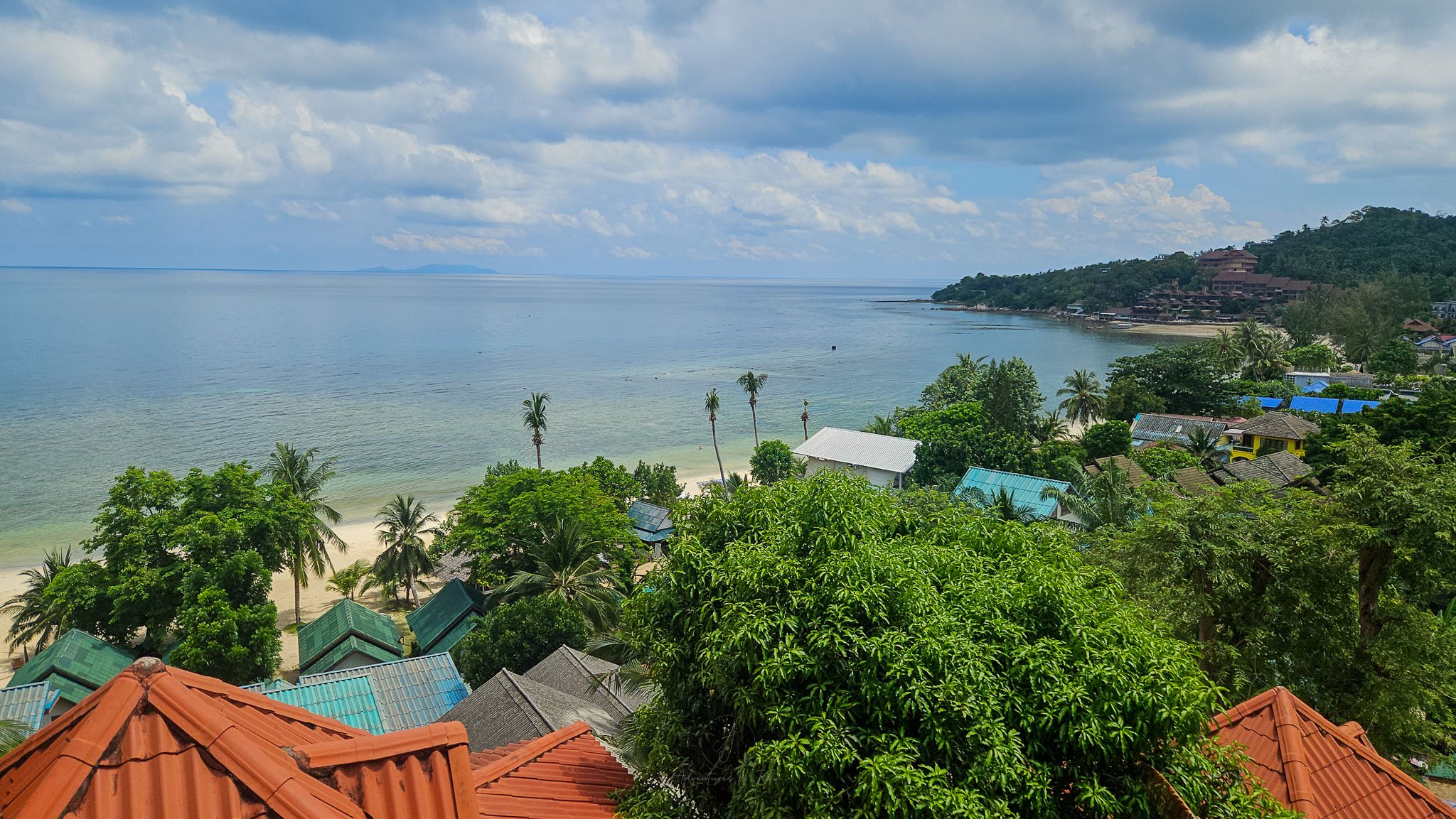 A view over Haad Yao Beach and the beachside bungalows that line the shore taken from the balcony of the What's Cup cafe.