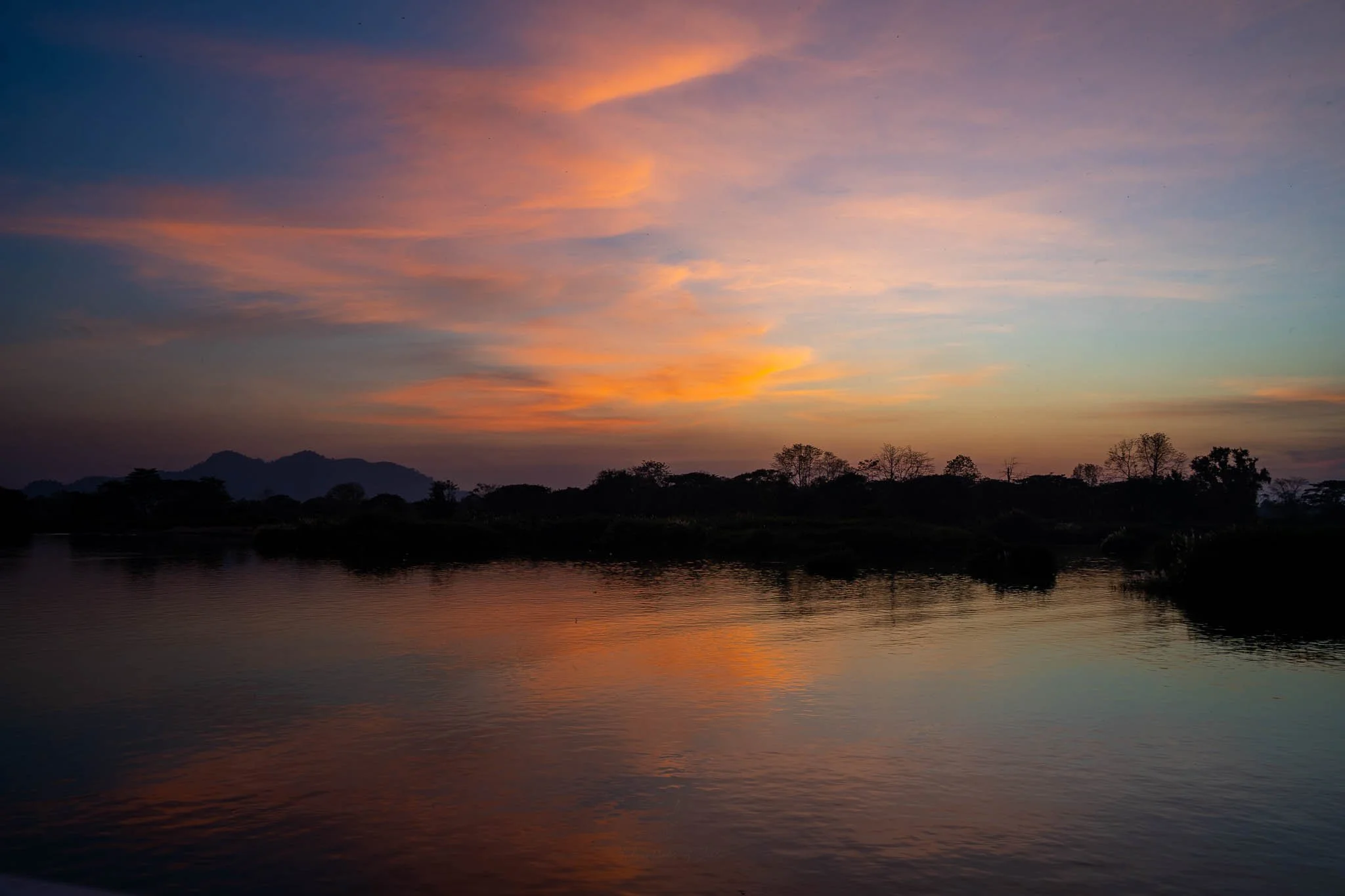The sunsets over the Mekong and islands of Don Det.