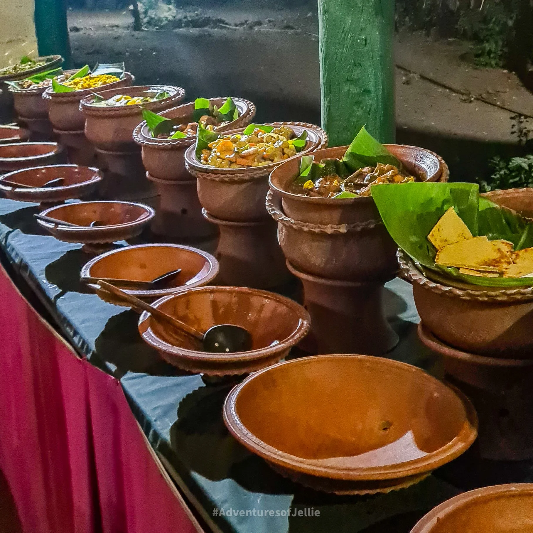 Clay pots filled with colourful curries make up a buffet at Magic restaurant in Habarana, Sri Lanka.