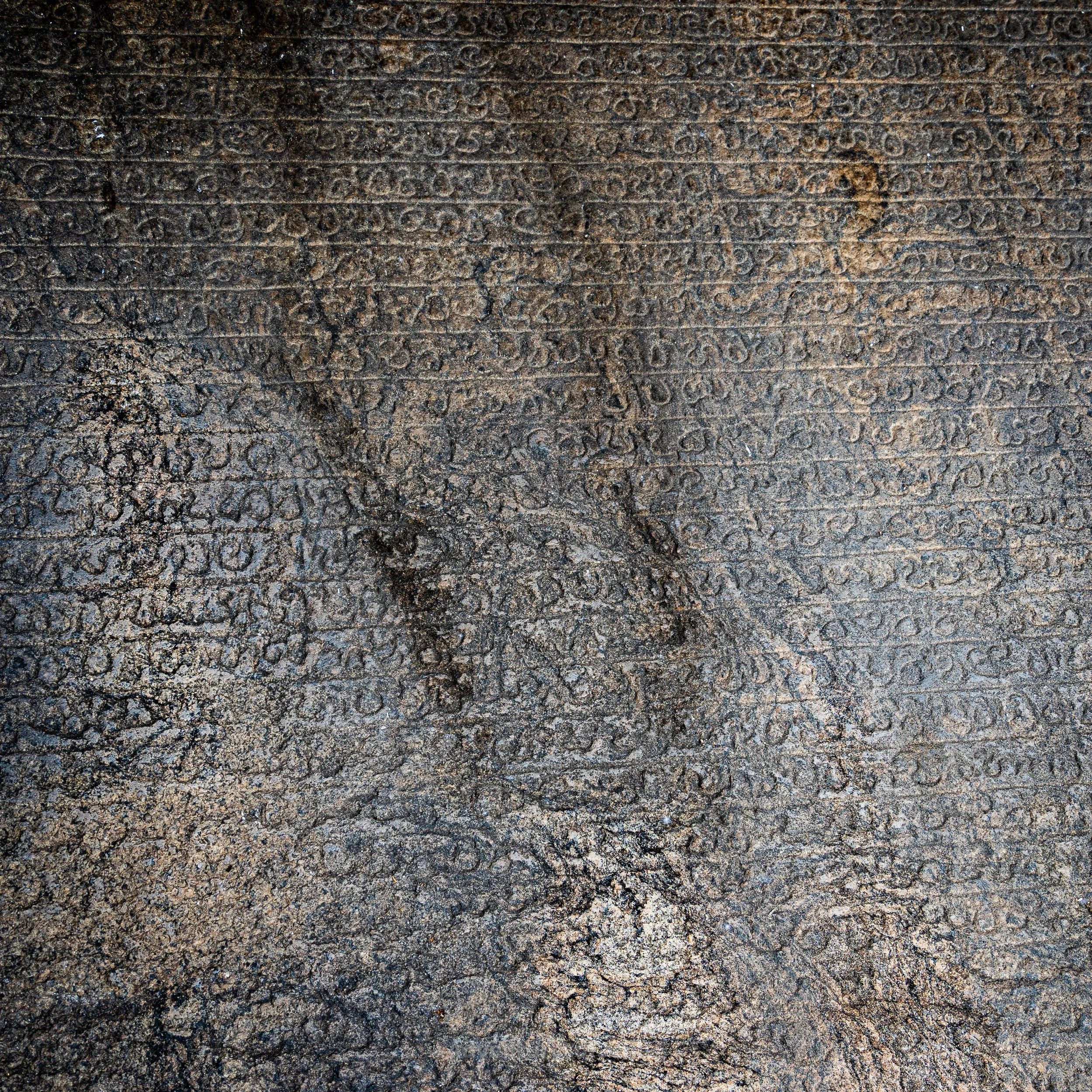 Intricate engravings on the Kiriti Nissankamalla stone inside the grounds of the Dambulla Royal Cave Temple