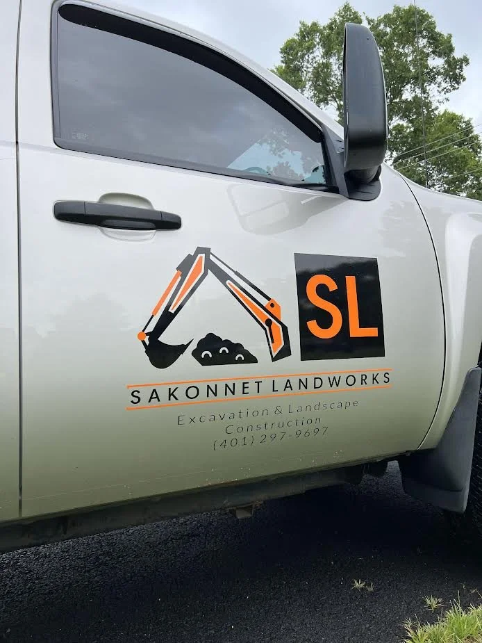 Sakonnet Landworks!  Cool logo with eye catching bright orange vinyl.  Can't miss this one driving by