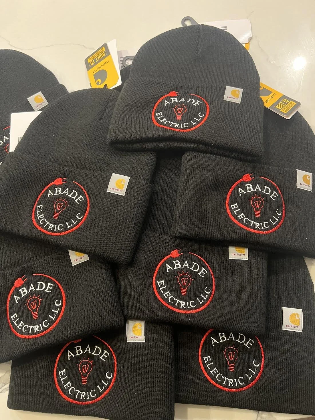Embroidered Carhartt Beanies for Abade Electric out of New Bedford, MA.