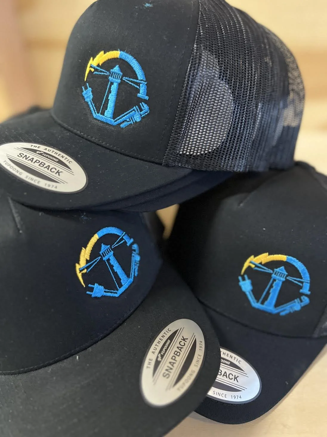 Custom Embroidery company logos on some snapback hats!