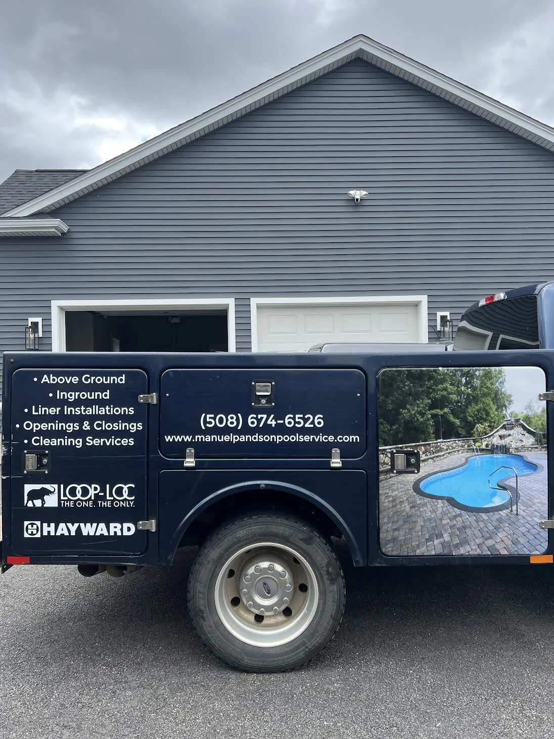 Utility Pick Up complete with High Performance Vinyl on Rocker Panels, Utility Boxes & Rear with a full image door wrap.