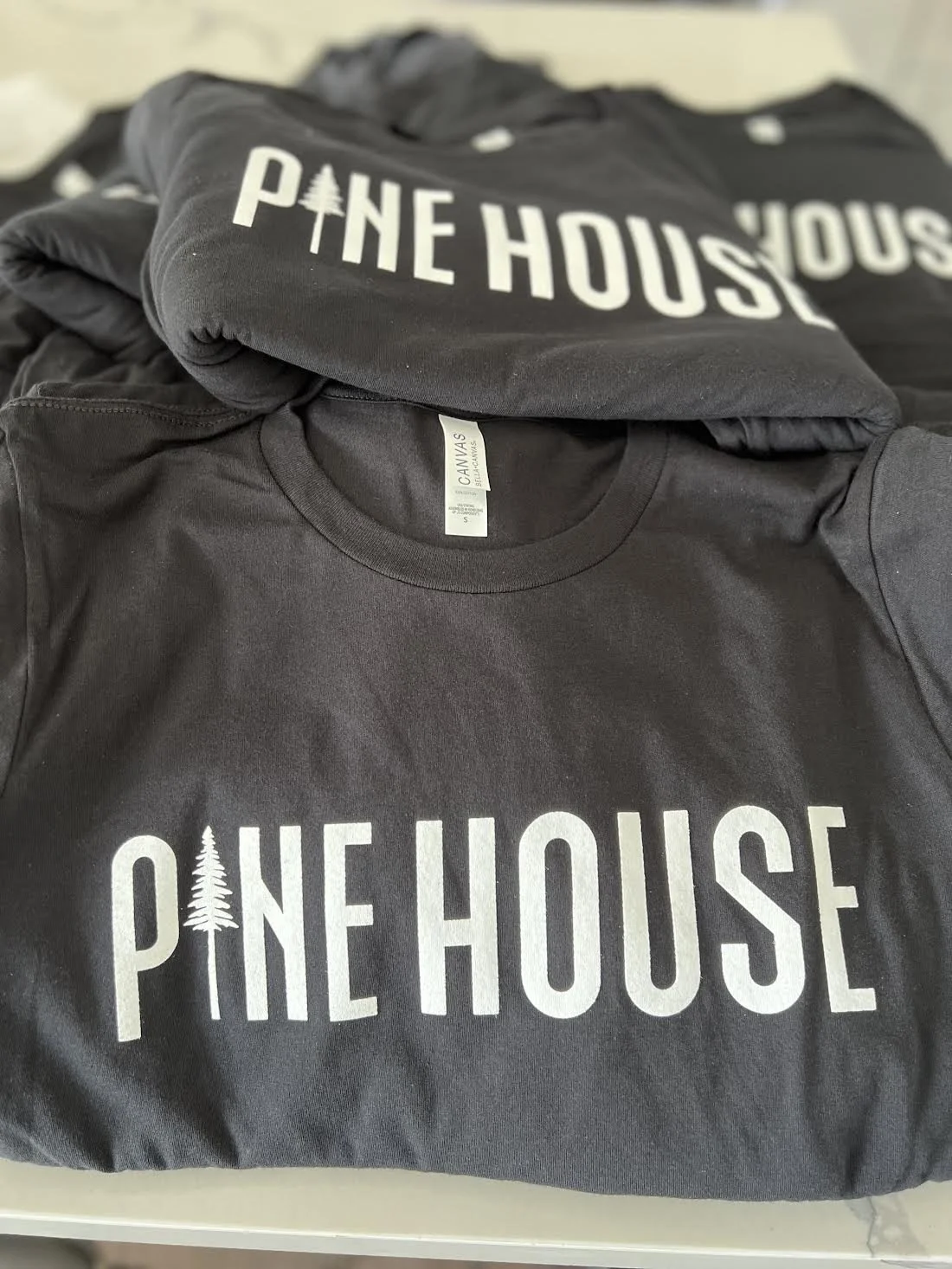 250 Screen Printed T Shirts for the crew at Pine House!