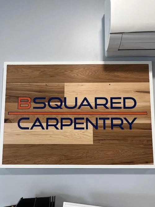 Customer Built two of these wood signs and we went in to Decal them up with both business Logos!