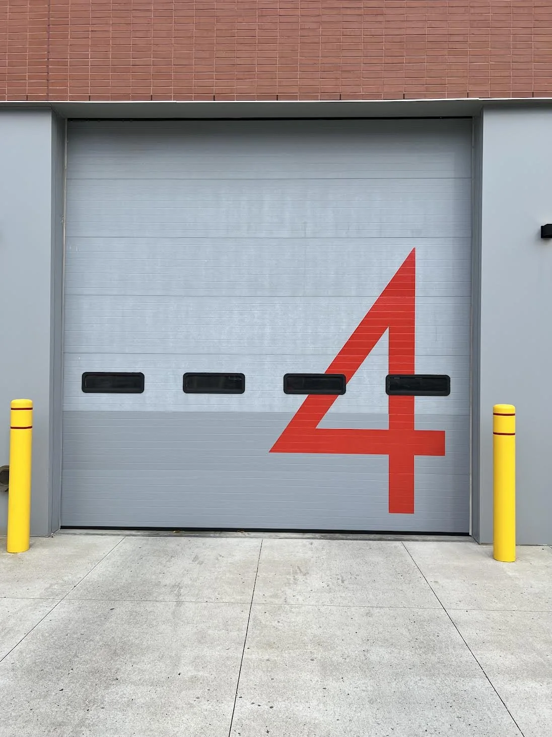 NB Police & Fire replaced the bottom half of their garage so we came in with a new 9' number 4 for their team!!
